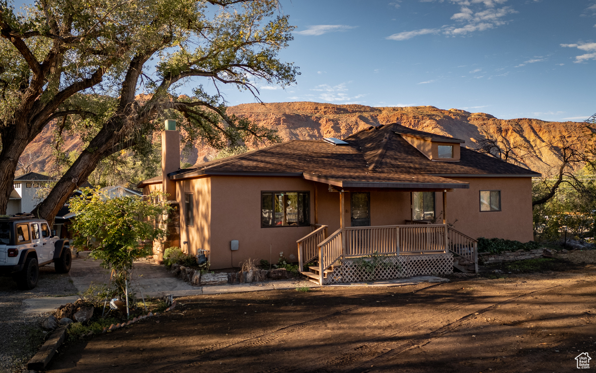 View of front of home featuring a mountain view and a porch