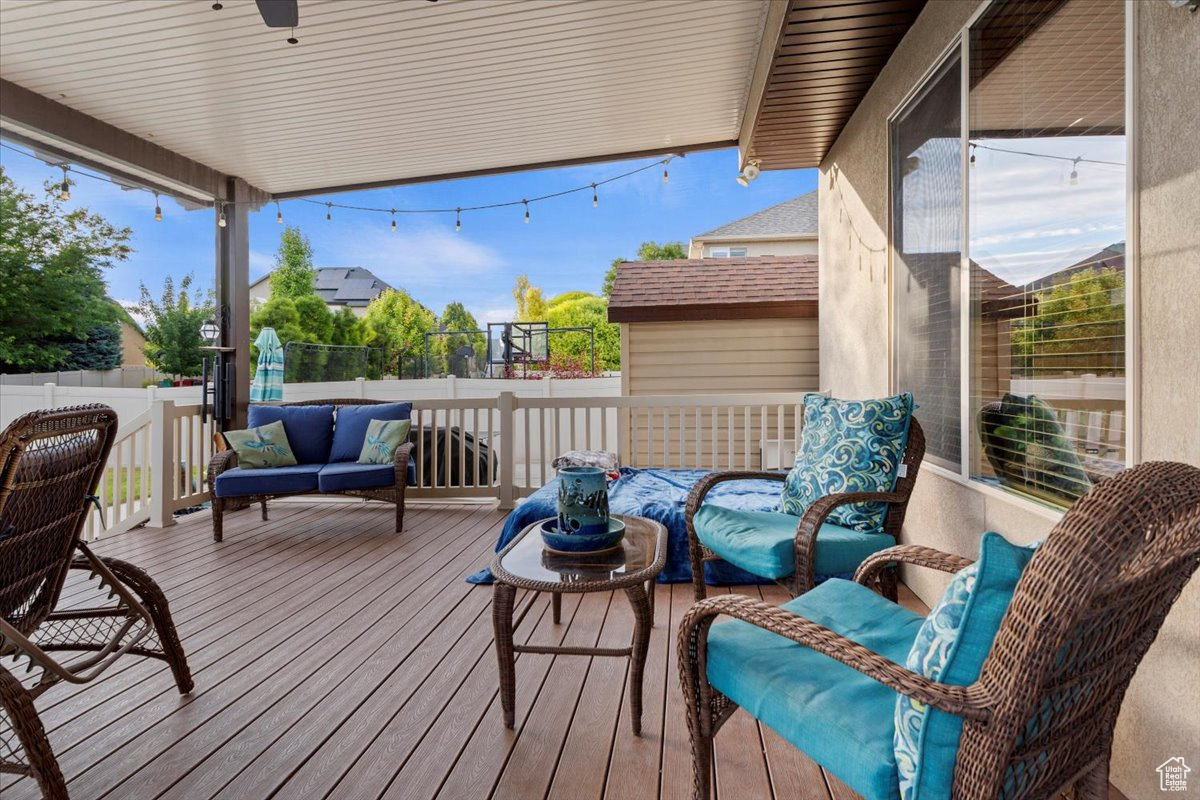 Wooden terrace with an outdoor living space