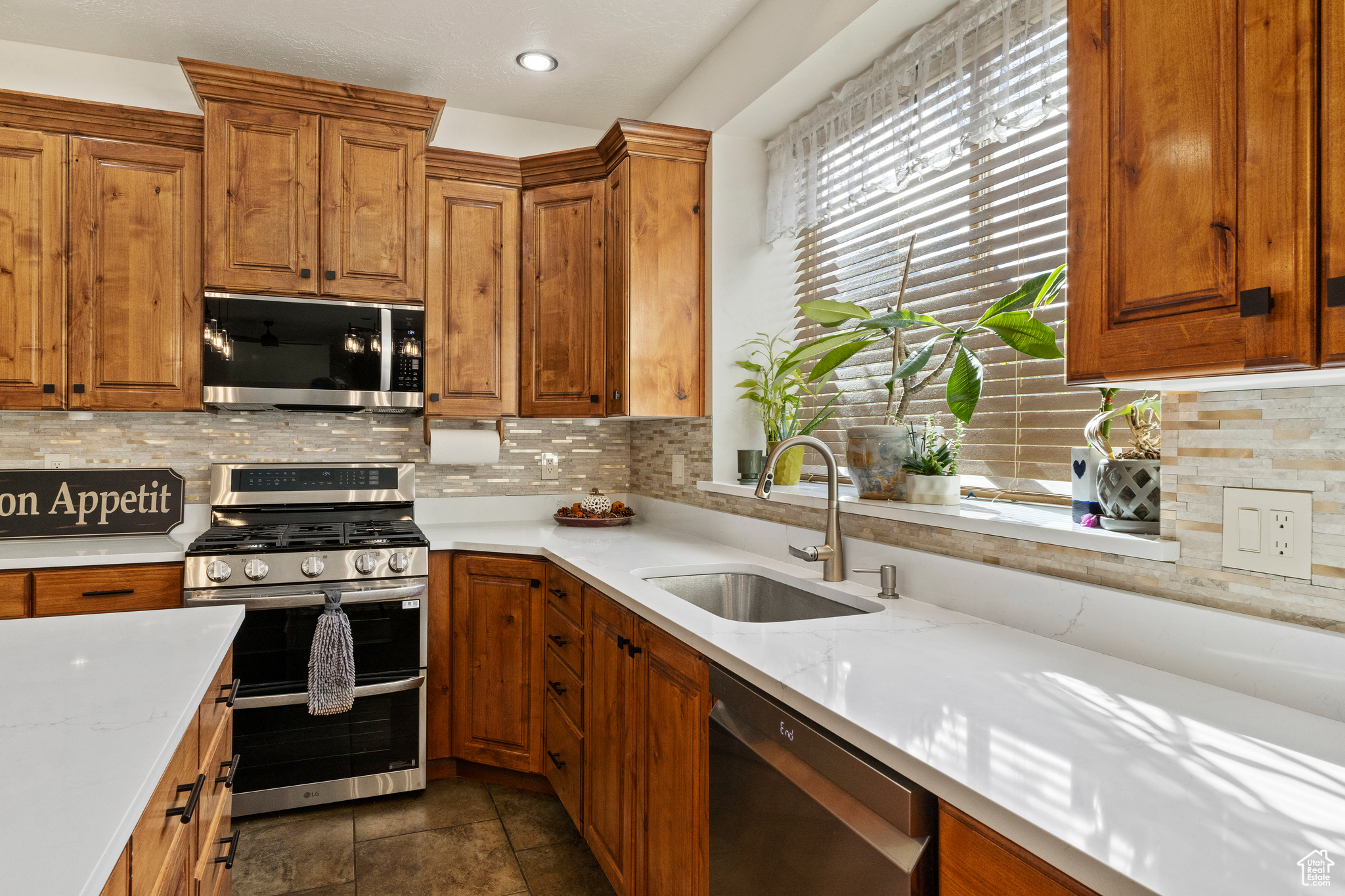 NEW appliances, new countertops, new sink, new light fixtures and polished cabinets