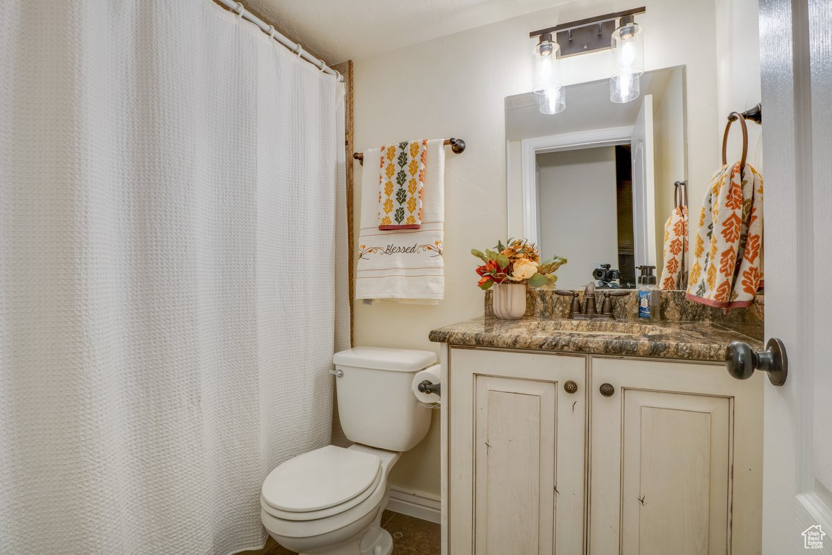 Bathroom with vanity and toilet