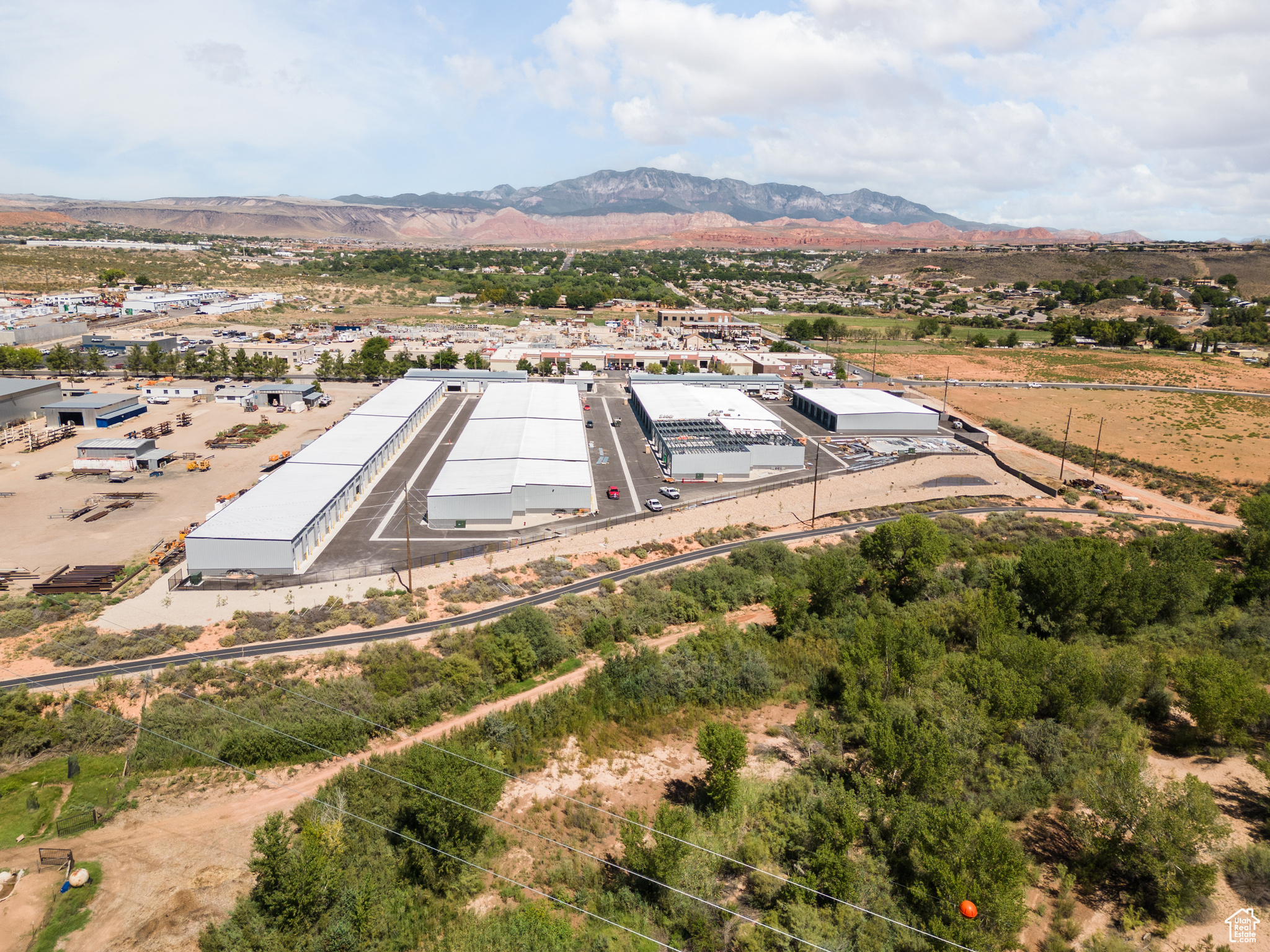 Birds eye view of property with a mountain view