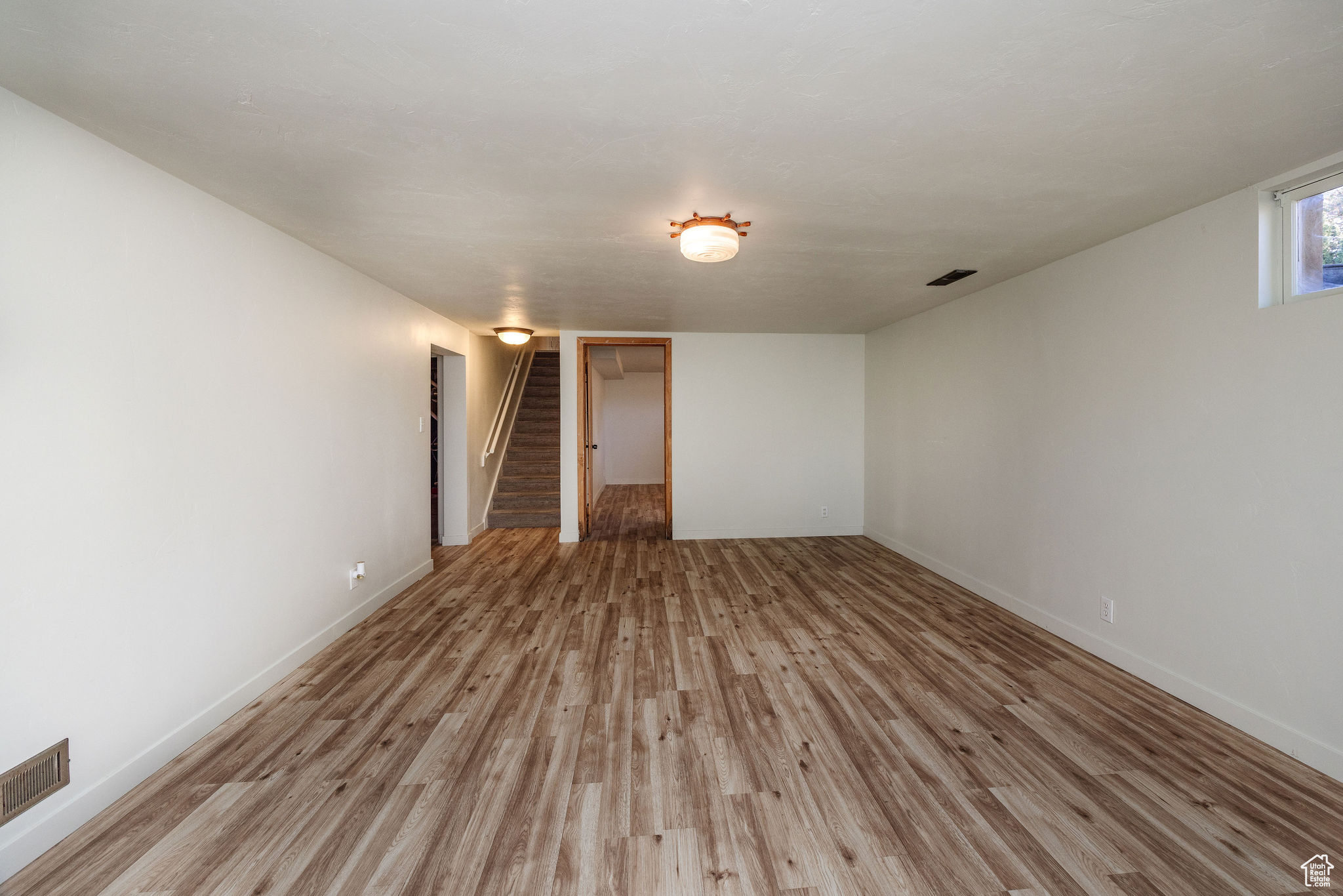 Family room with light LVP flooring