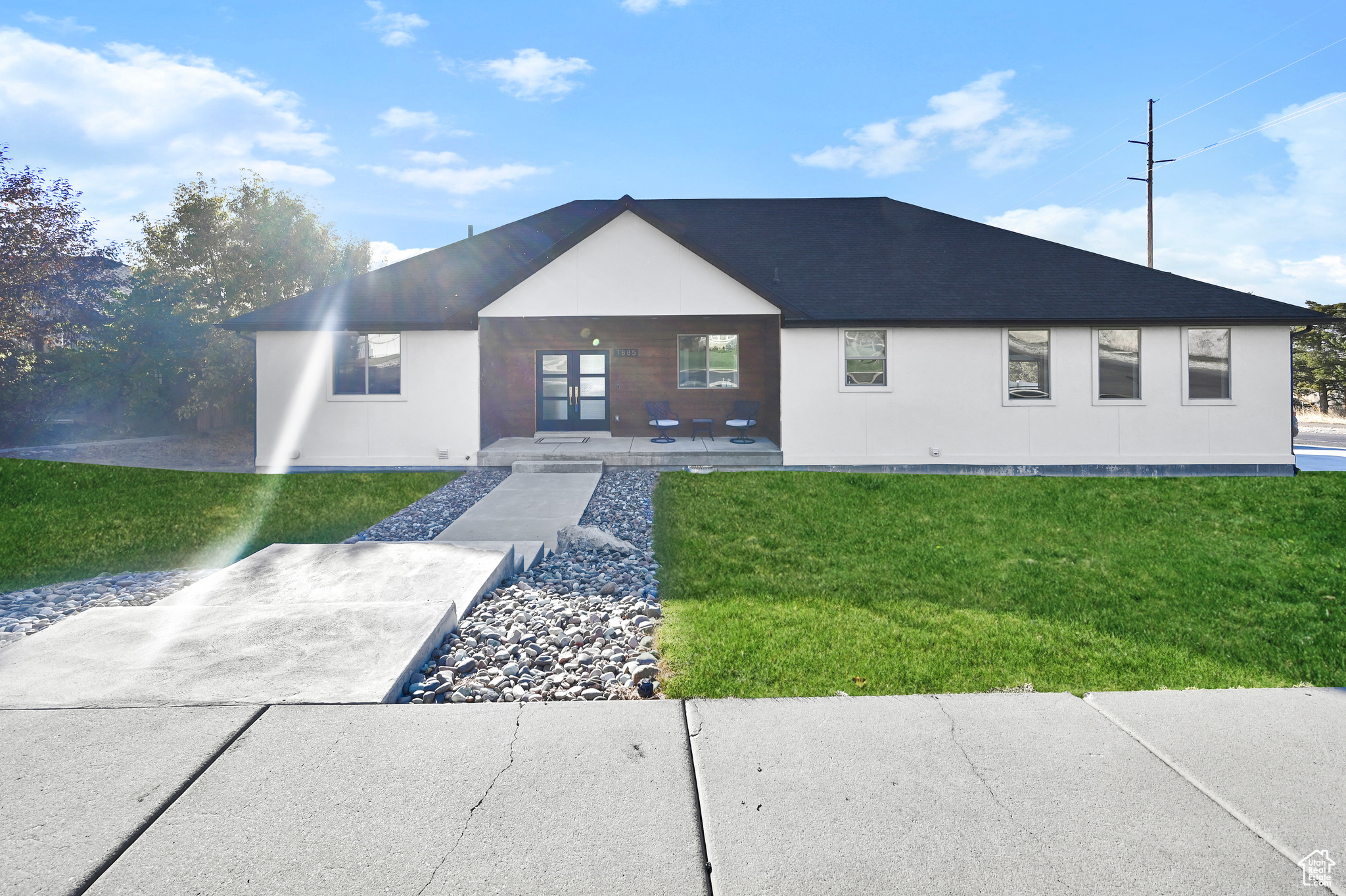 View of front of house with a front yard