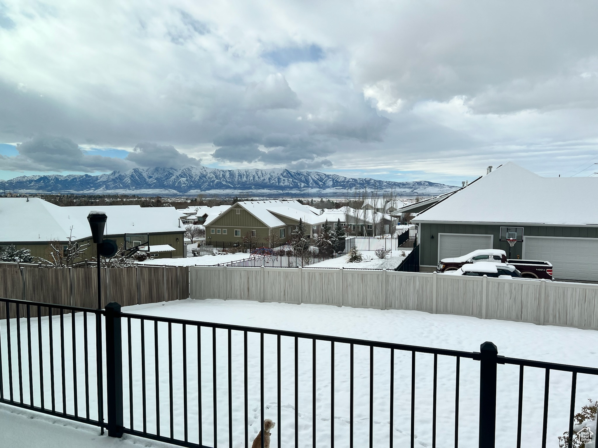 Exterior space featuring a mountain view and a garage