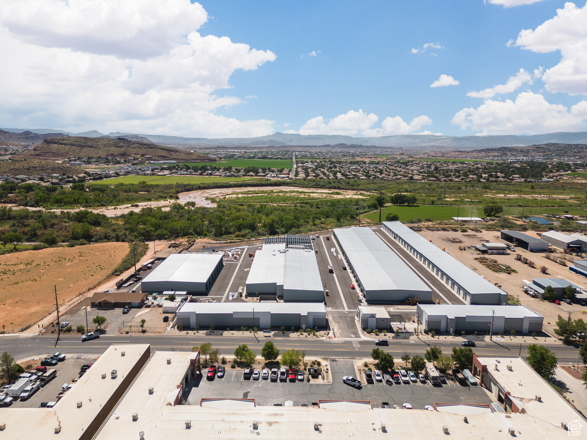 Birds eye view of property with a mountain view