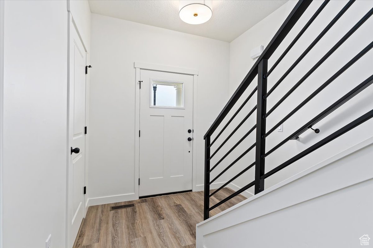 Foyer featuring light hardwood / wood-style floors