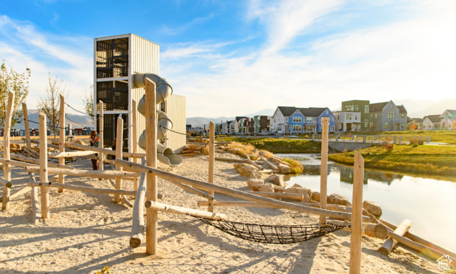 View of play area featuring a water view