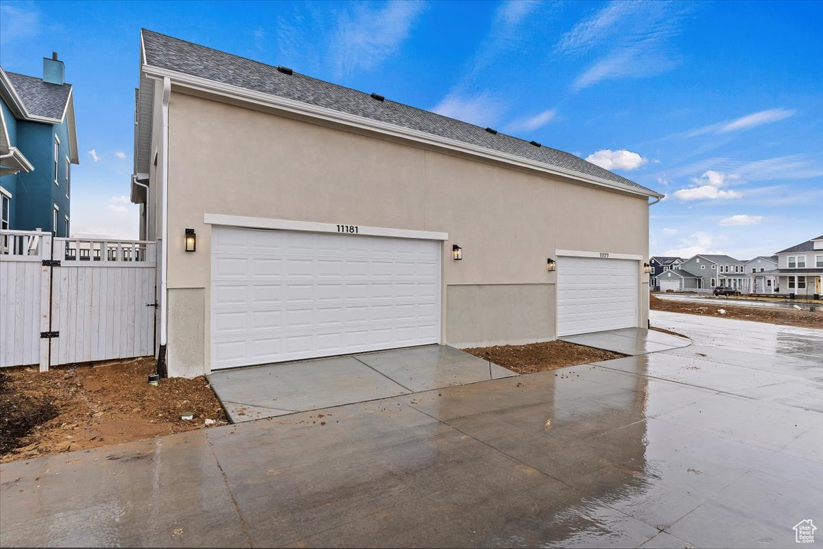 View of home's exterior featuring a garage