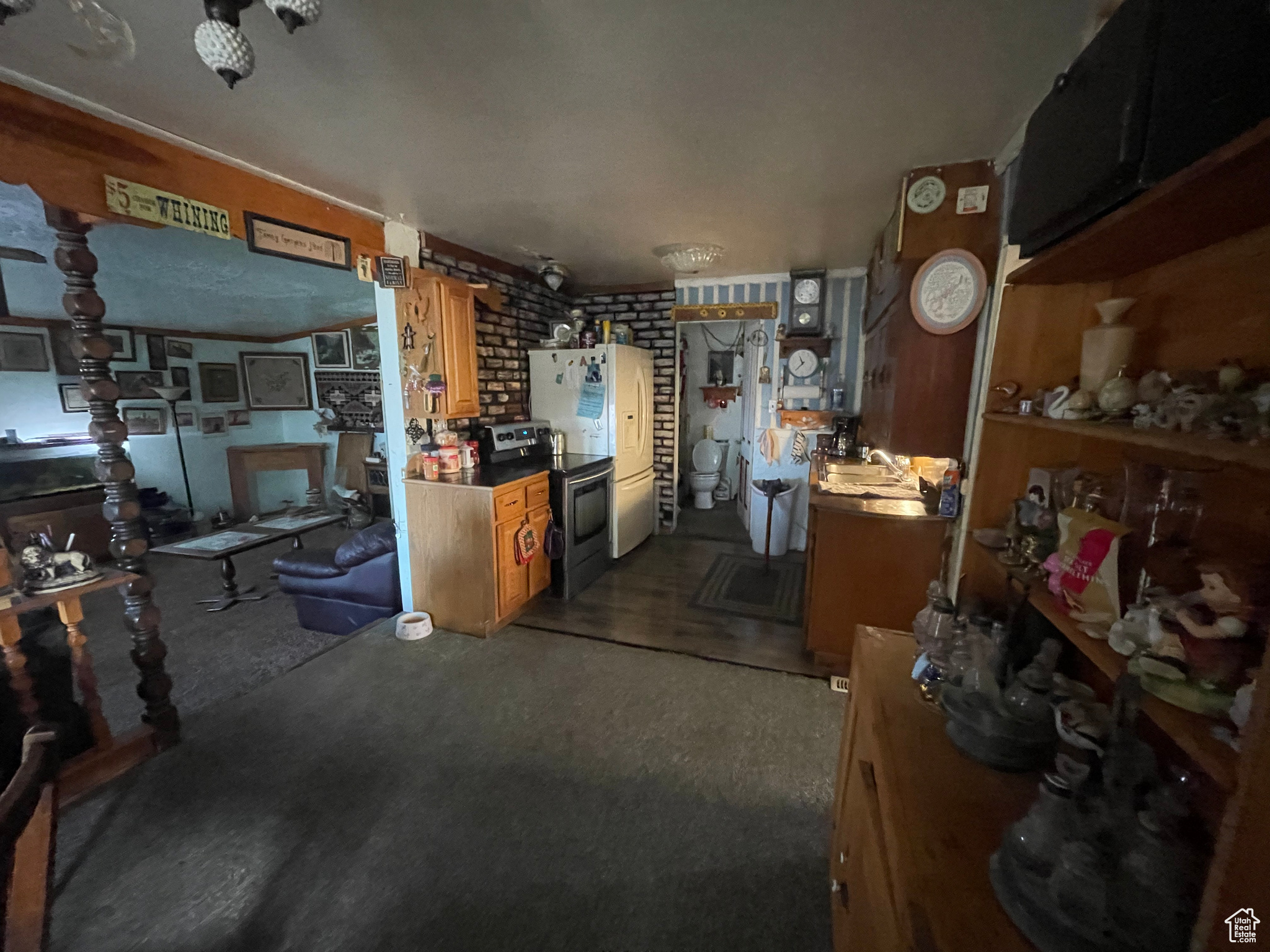 Misc room with dark carpet