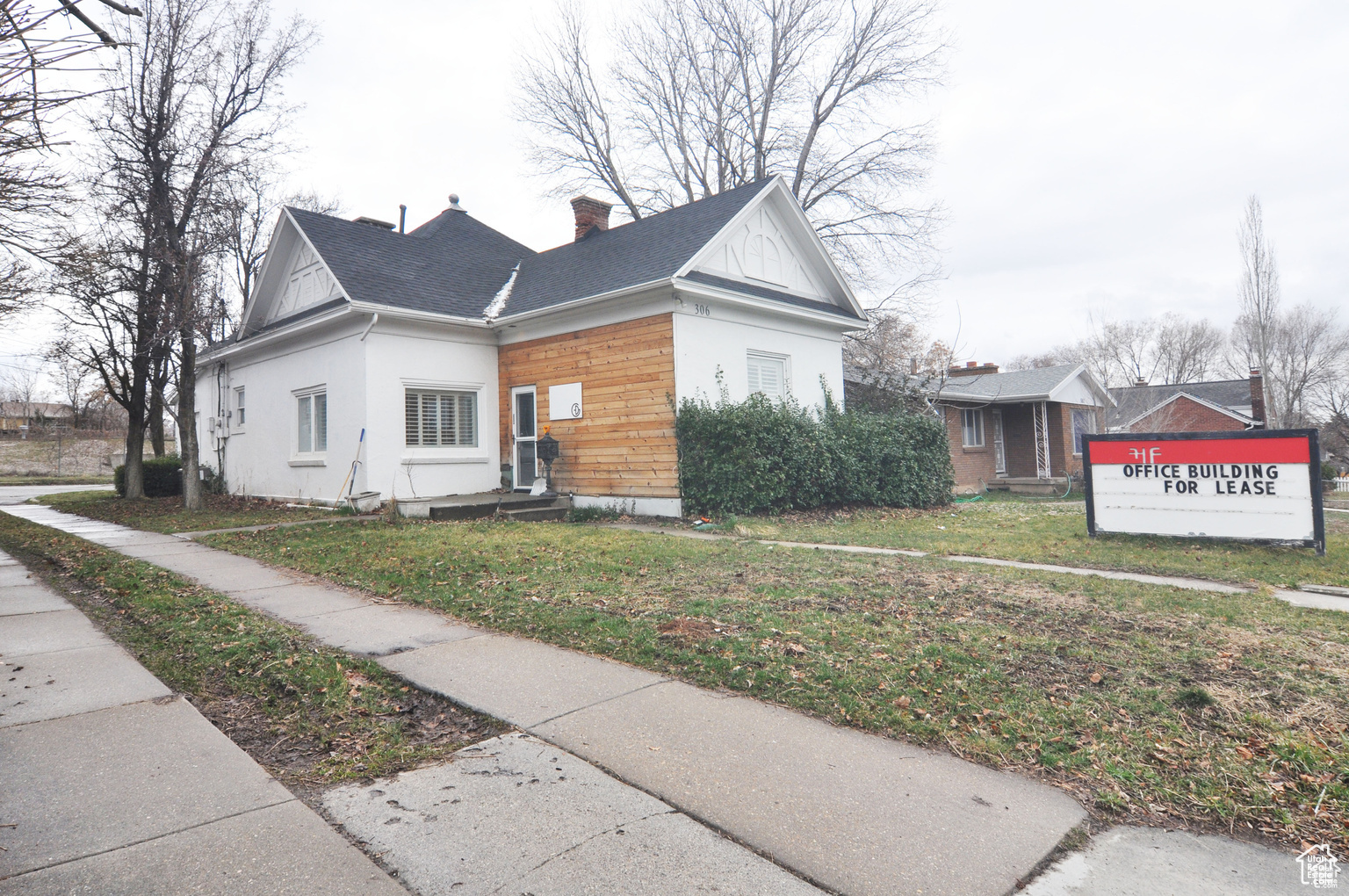 View of front of property with a front lawn