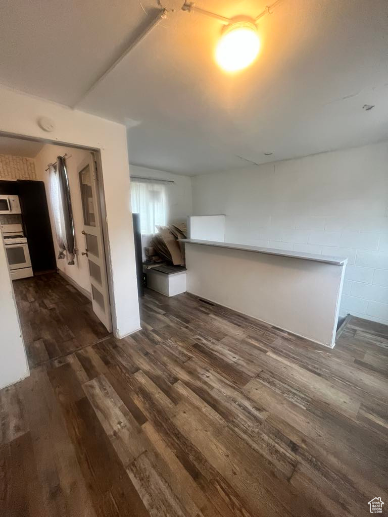 Interior space with dark wood-type flooring