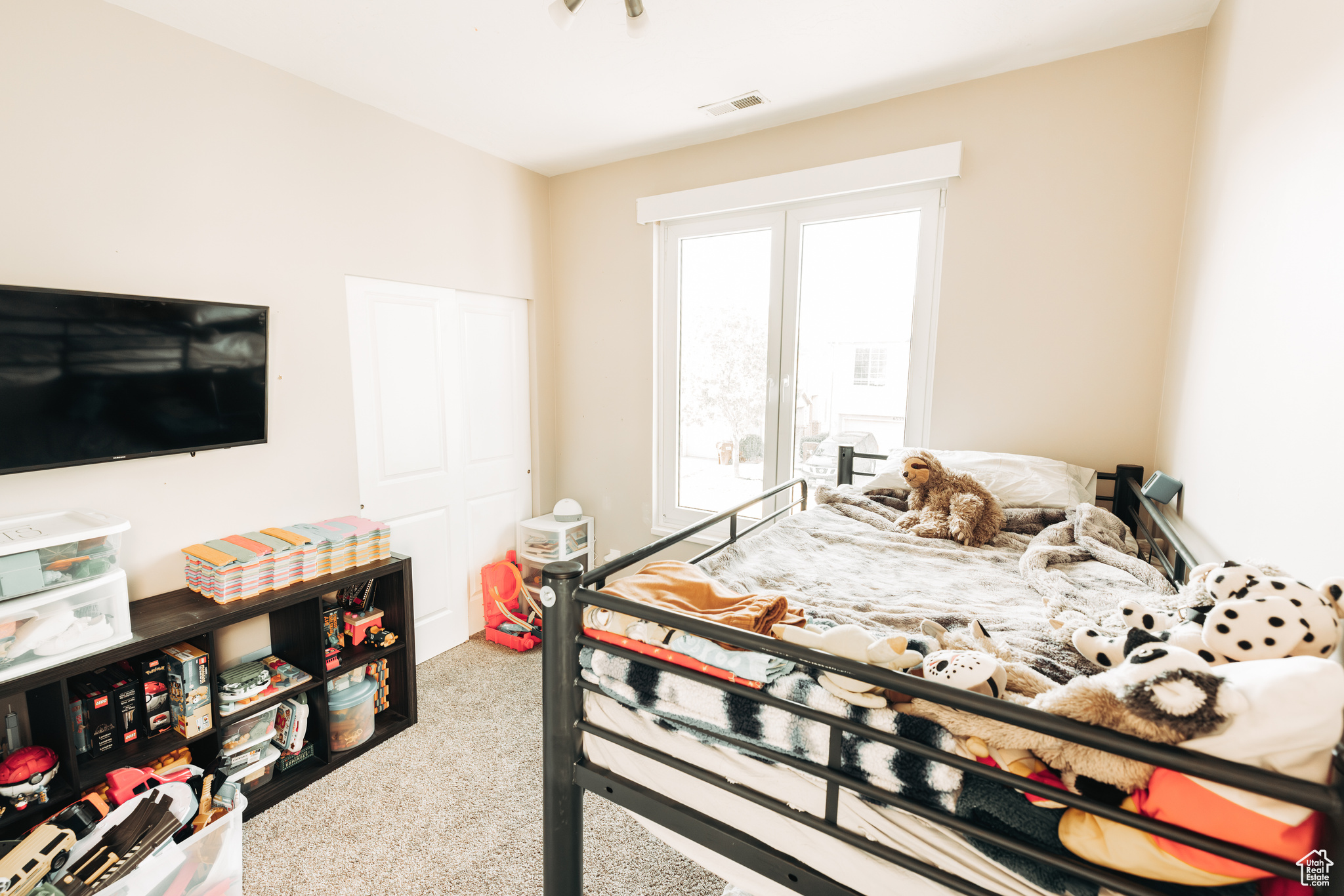 Bedroom featuring carpet floors