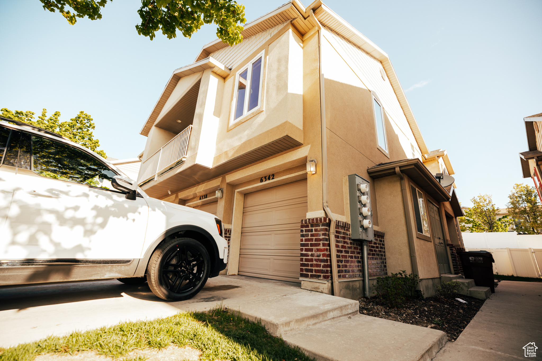 View of property exterior featuring a garage