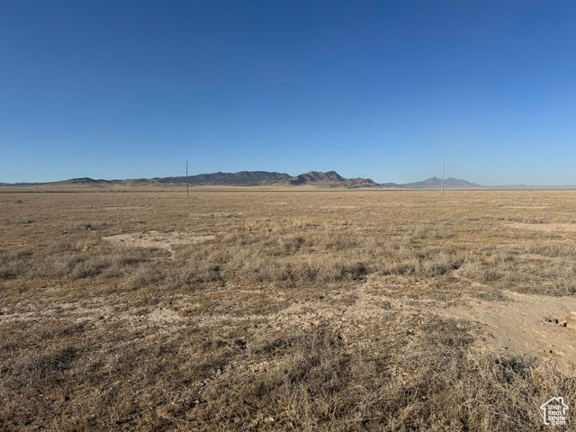 View of local wilderness featuring a mountain view and a rural view