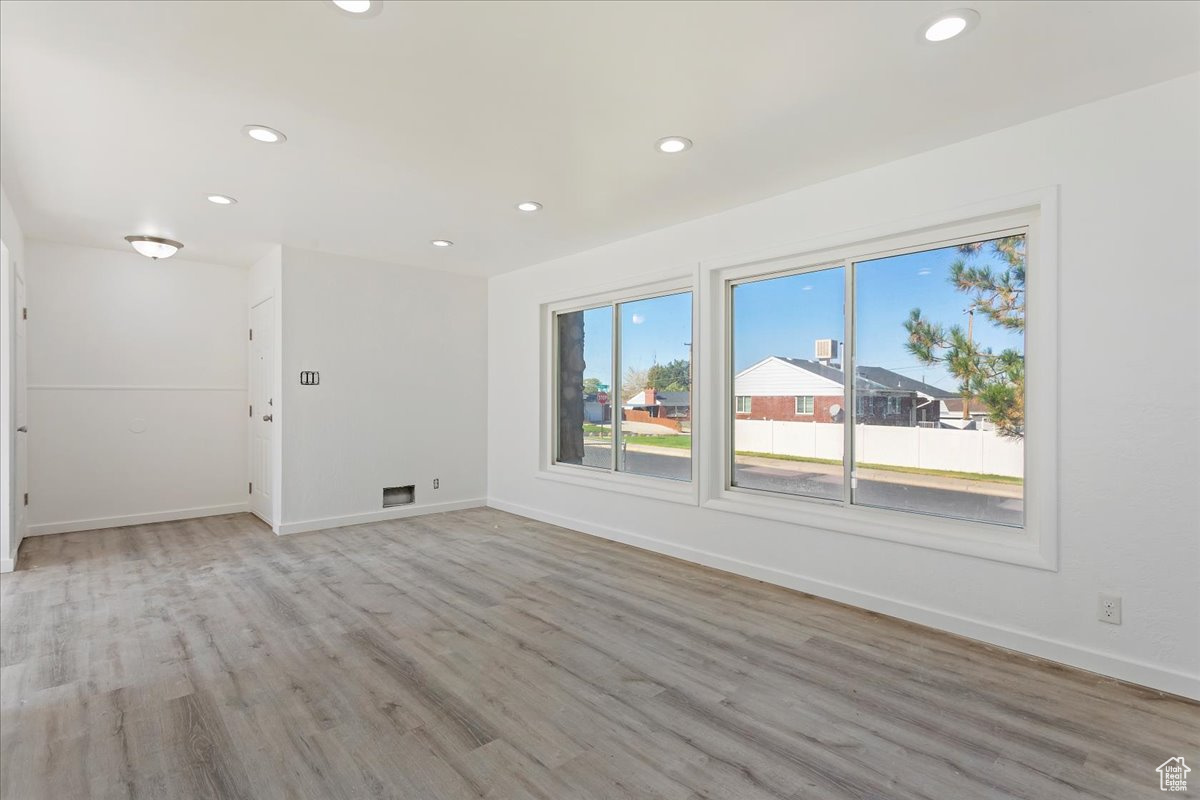 Unfurnished room featuring light hardwood / wood-style flooring