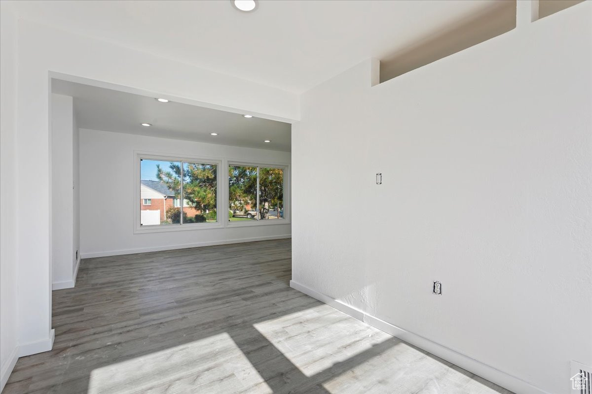 Unfurnished room featuring wood-type flooring