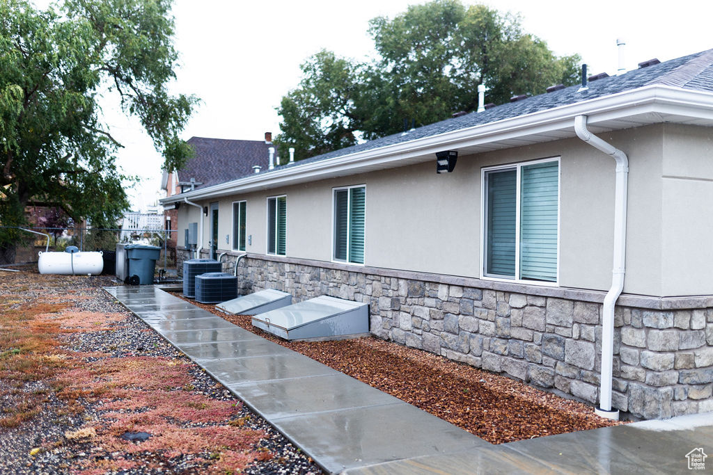 View of property exterior featuring a patio