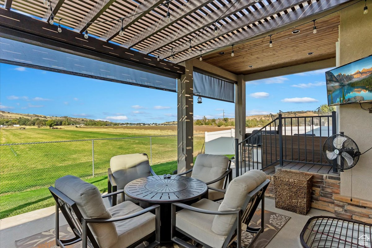 View of patio featuring a pergola