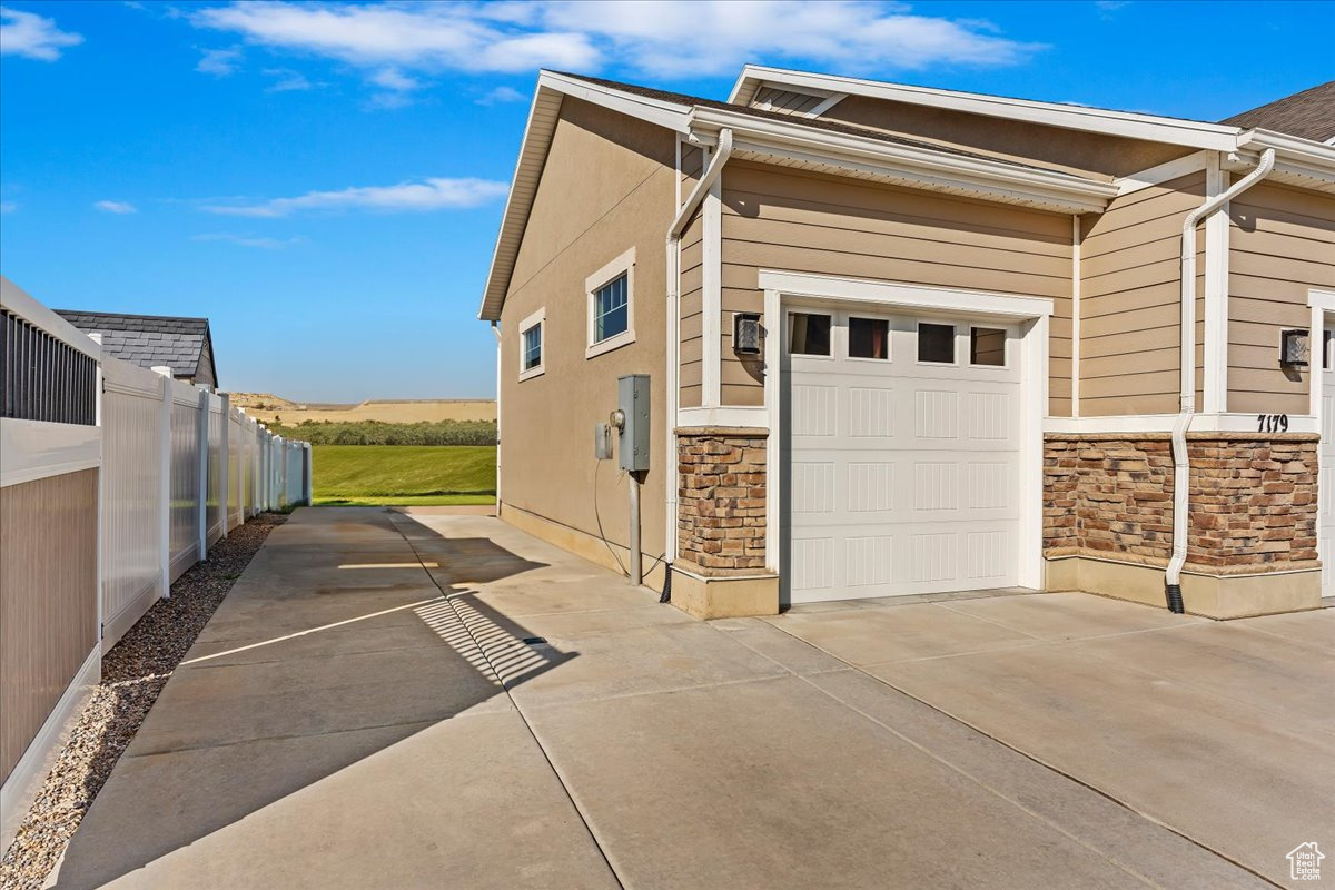 View of home's exterior with a garage