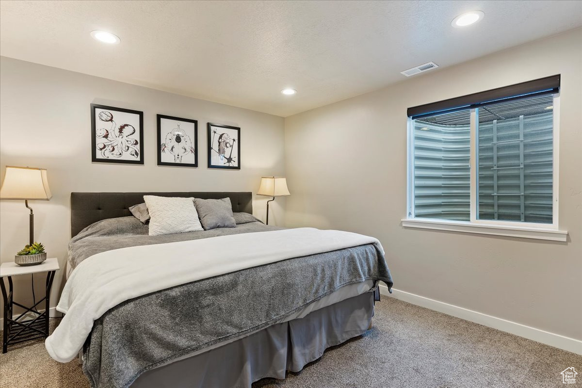 View of carpeted bedroom