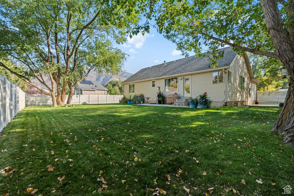 View of yard with a patio