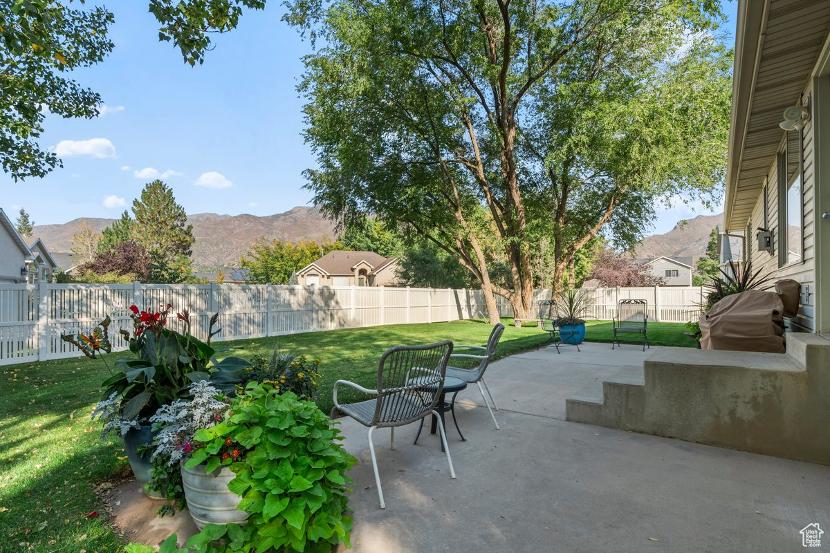 View of patio / terrace featuring a mountain view