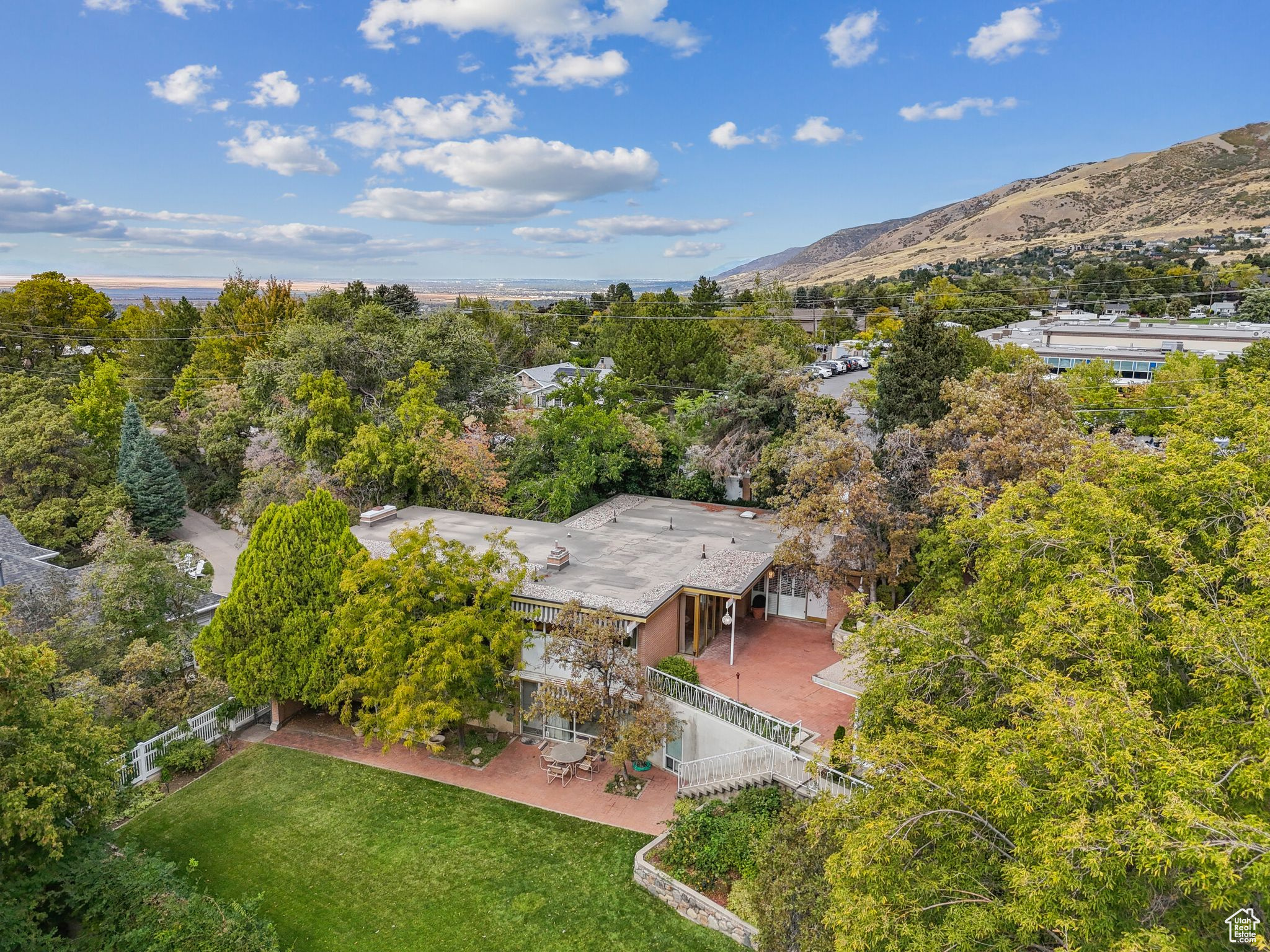 Birds eye view of property with a mountain view