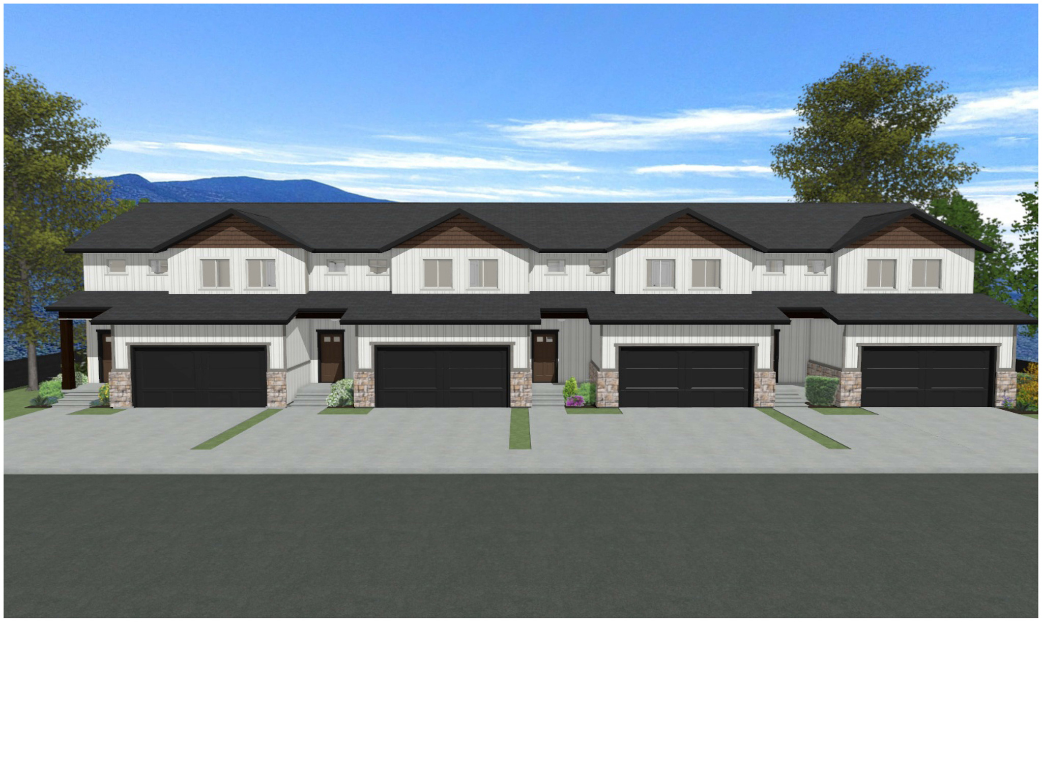 View of front of property with a garage and a mountain view