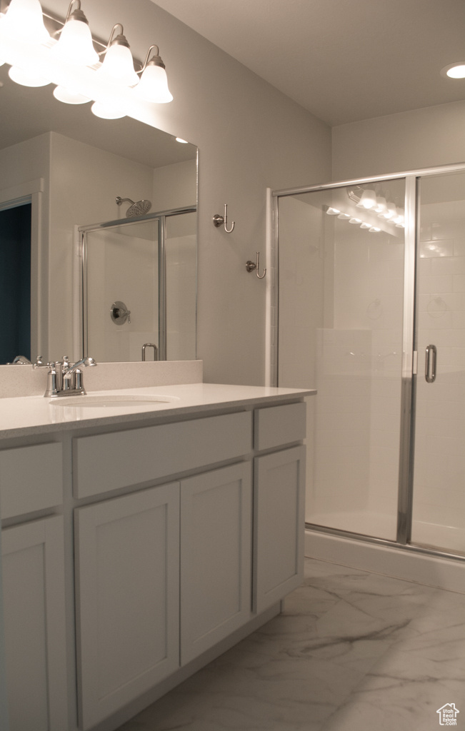 A crisp clean master bath with large shower! No bumping your elbows in a tiny shower stall!