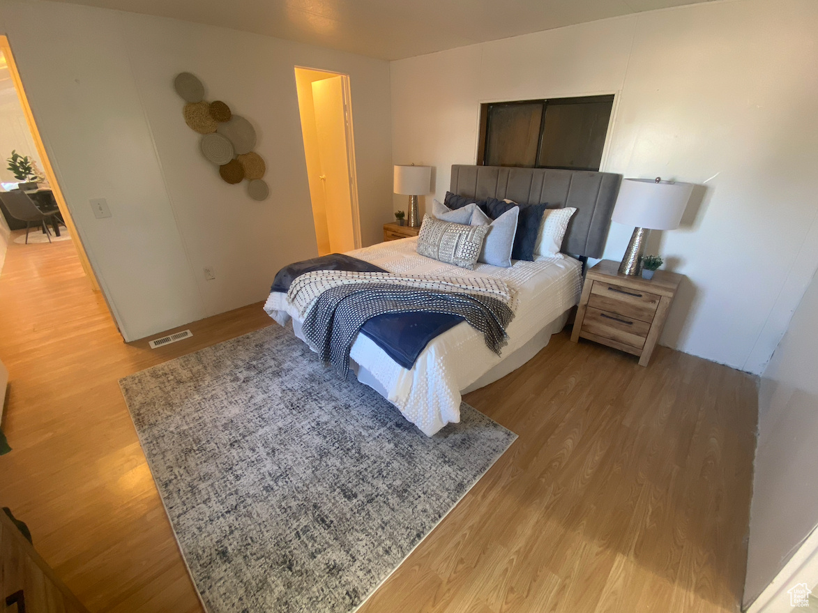 Bedroom featuring hardwood / wood-style flooring