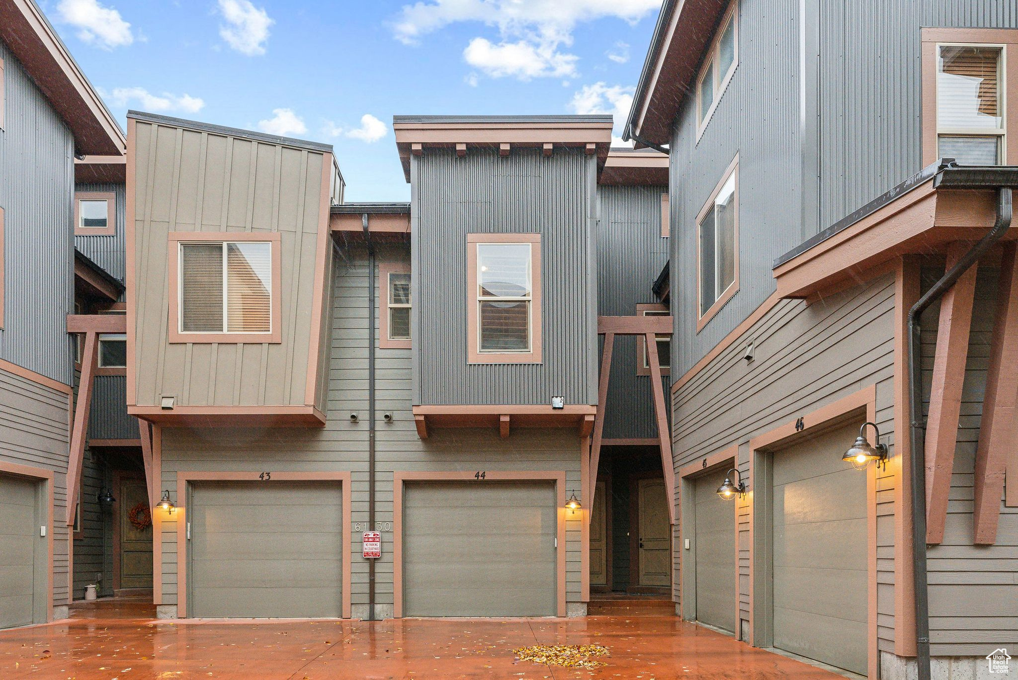 View of property with a garage