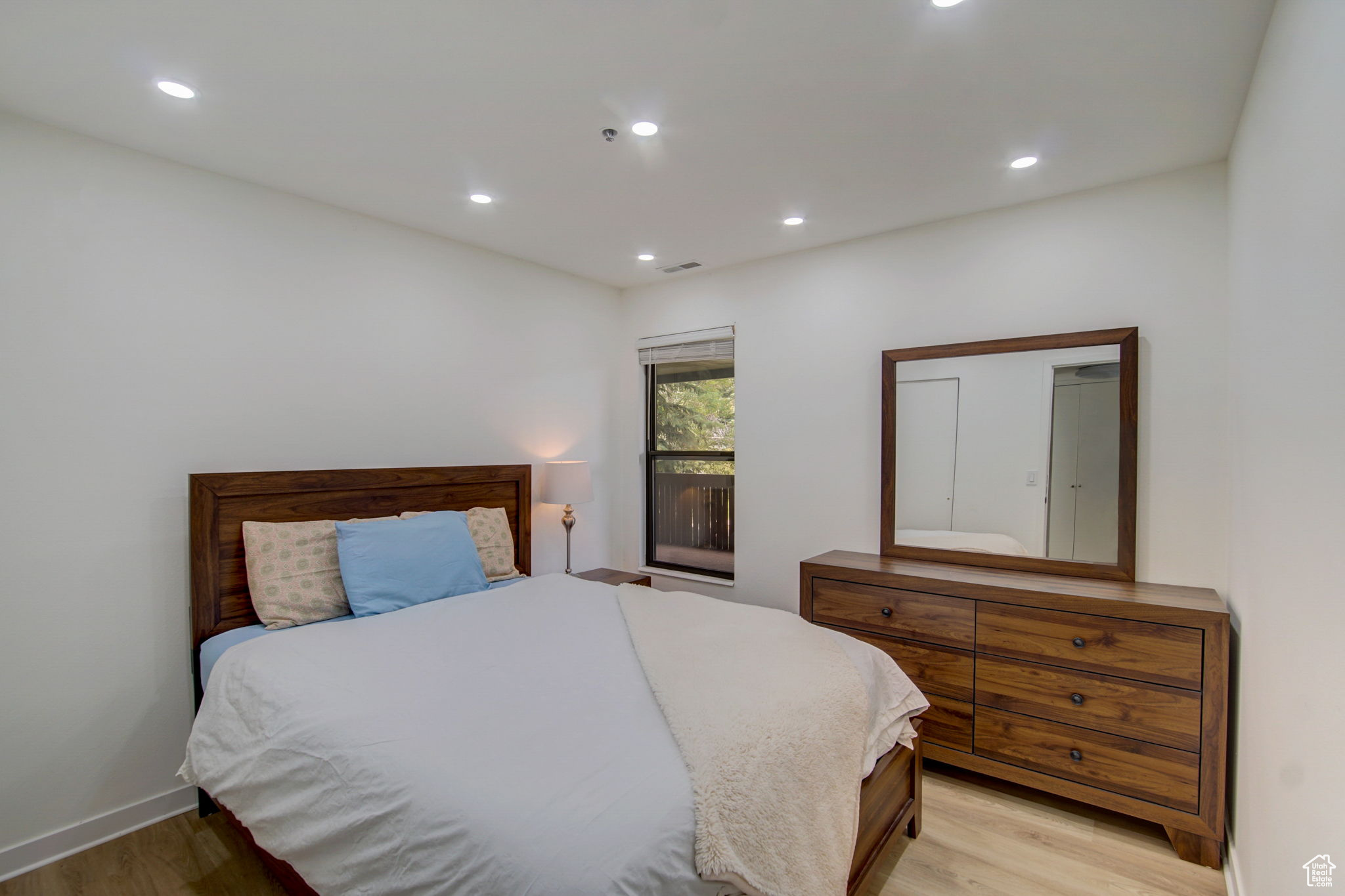 Bedroom featuring light wood-type flooring