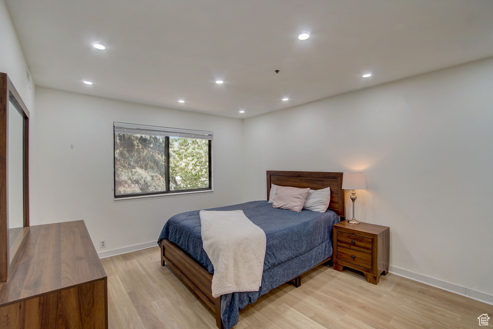 Bedroom with light wood-type flooring