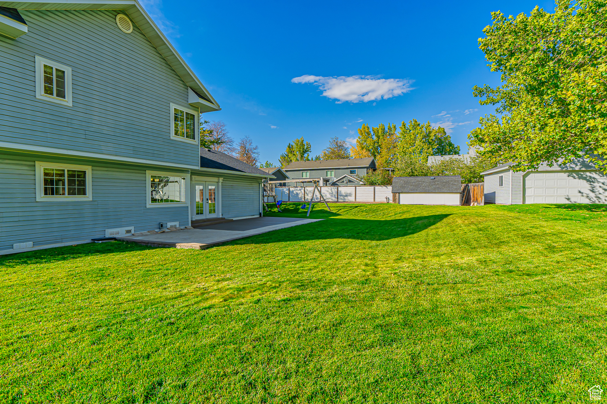 View of yard with a patio