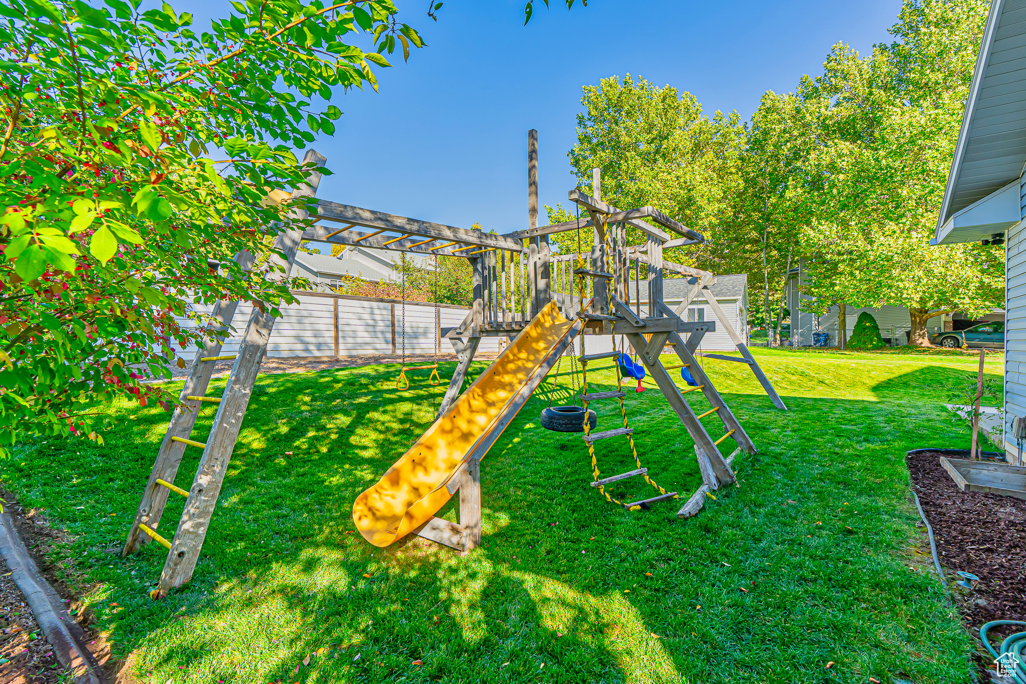 View of play area with a yard