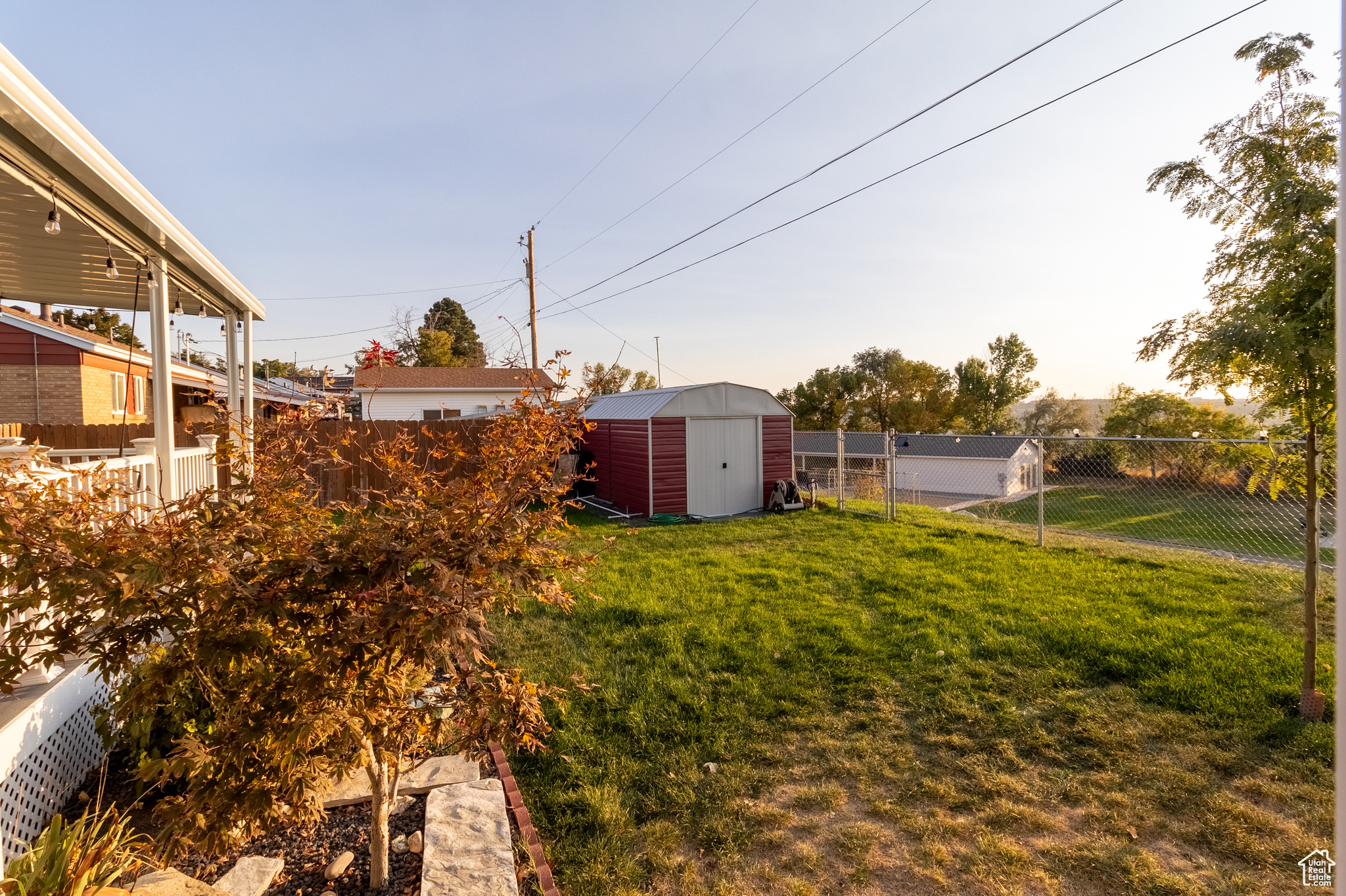 View of yard with a storage shed