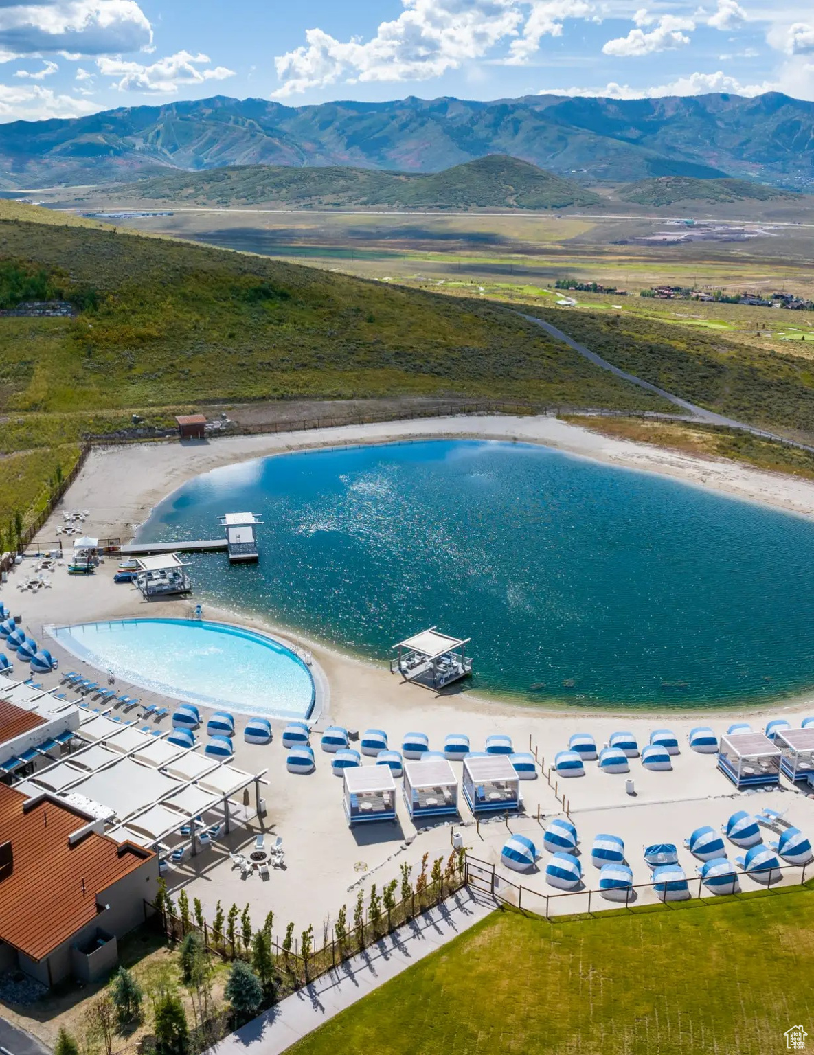 Bird's eye view featuring a water and mountain view