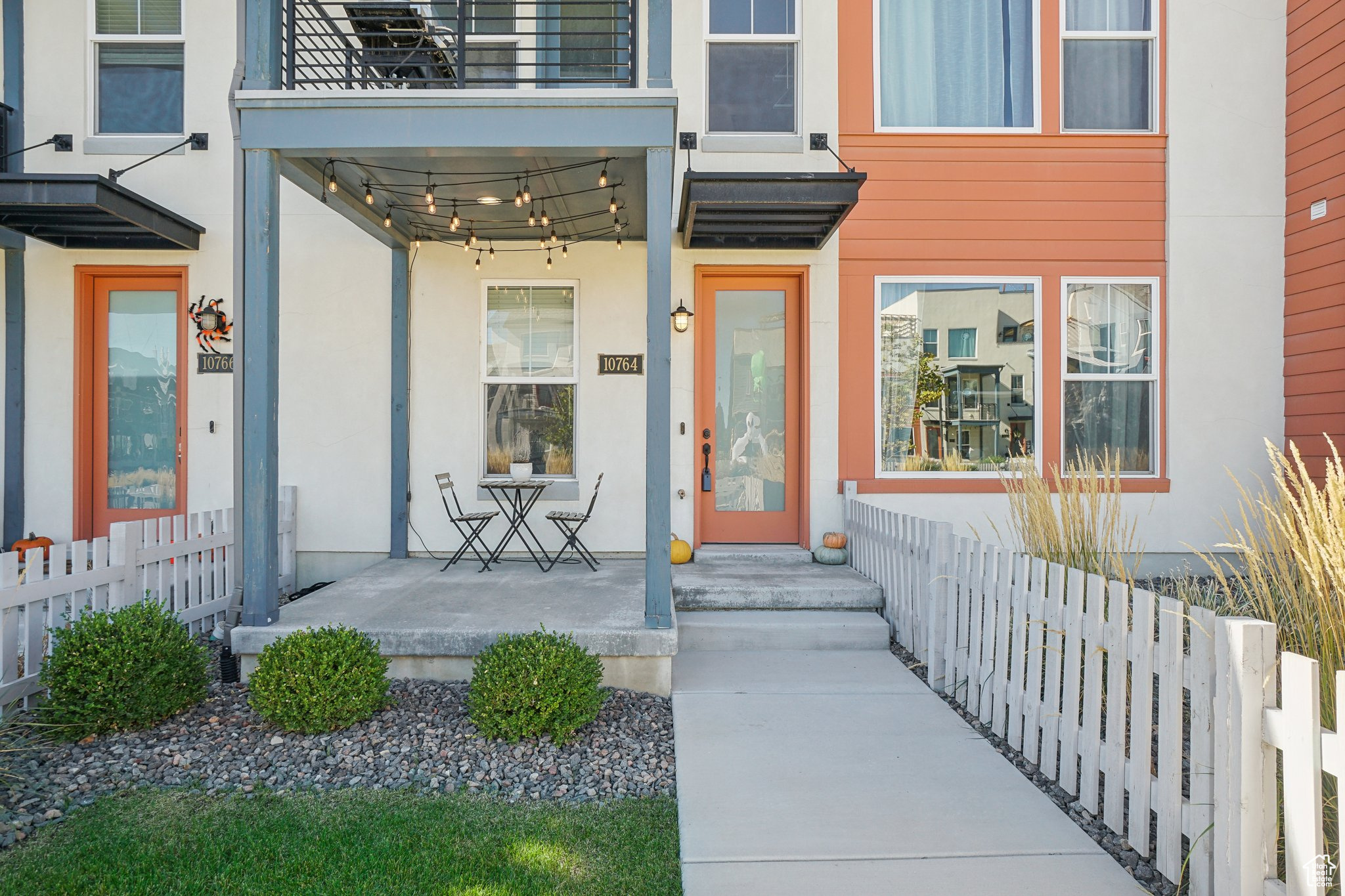 Doorway to property with a balcony