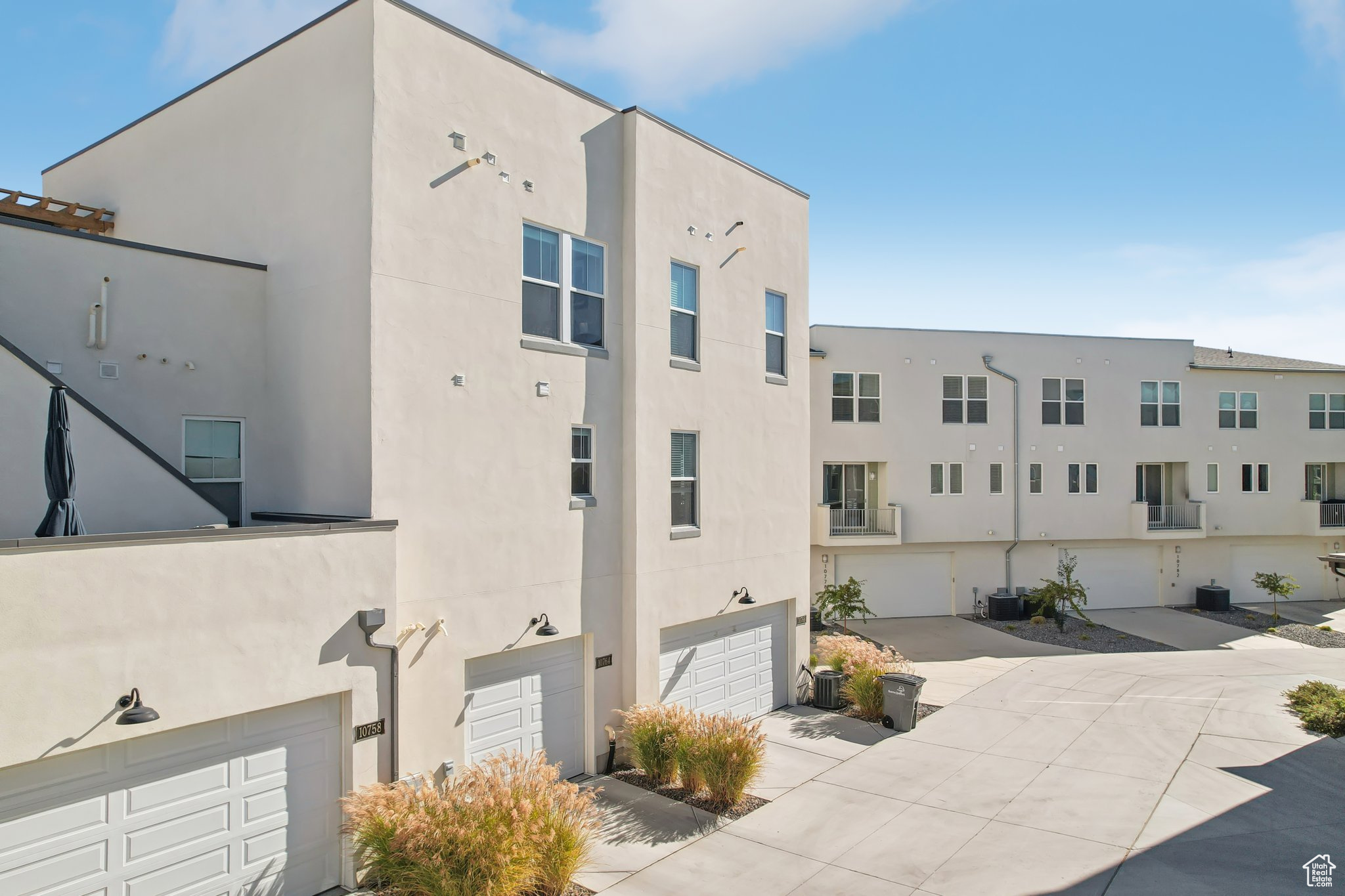 View of property featuring a garage