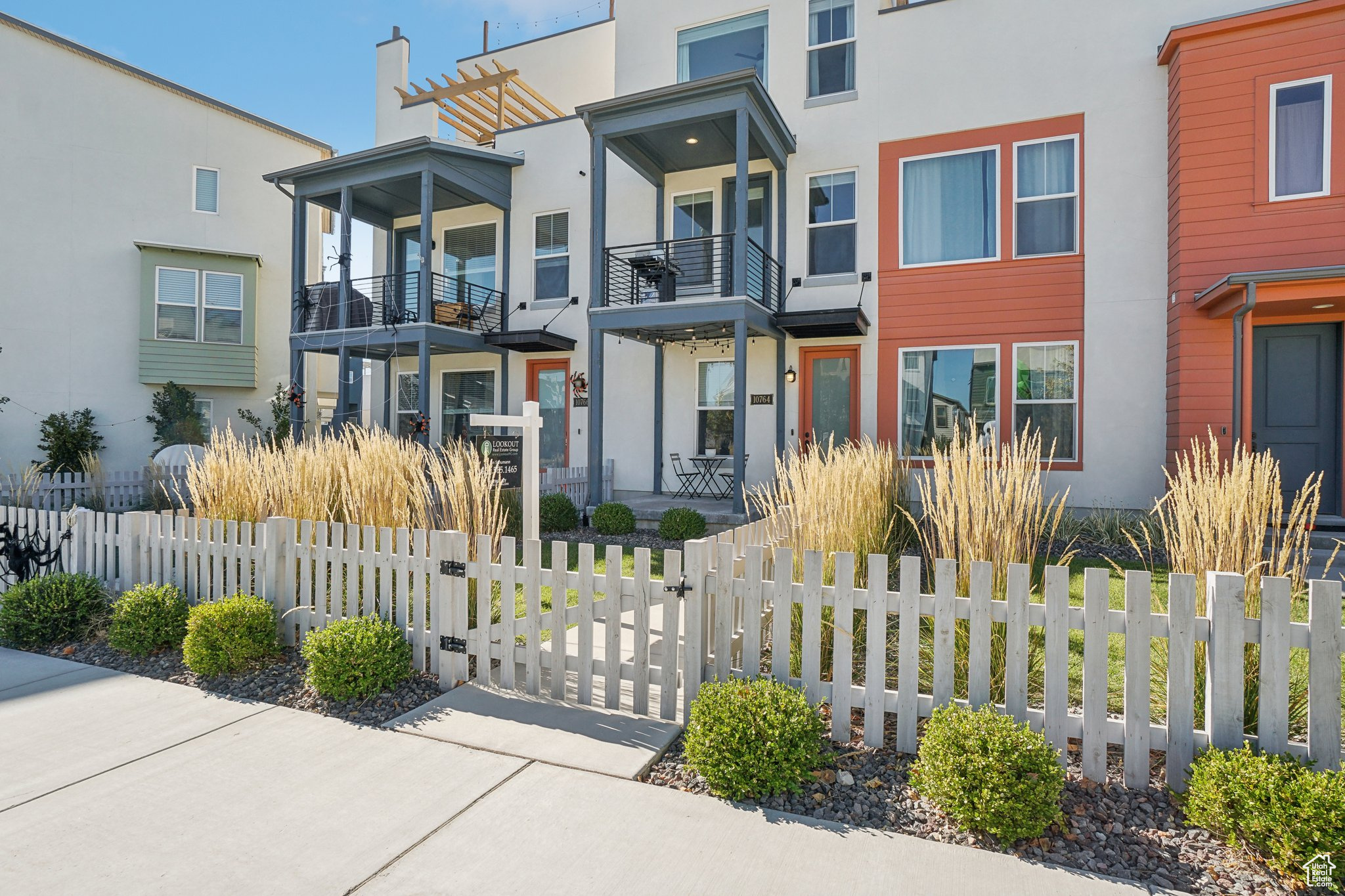 View of front of home with a balcony