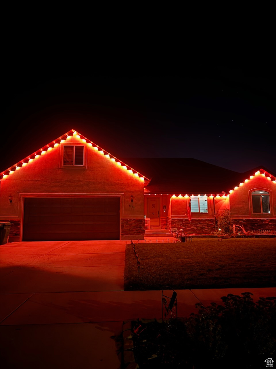 View of front of home featuring a garage