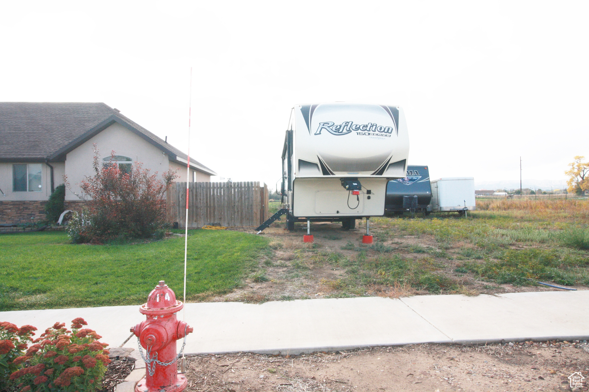 View of side of home featuring RV parking. Permission granted by the owner of the lot.