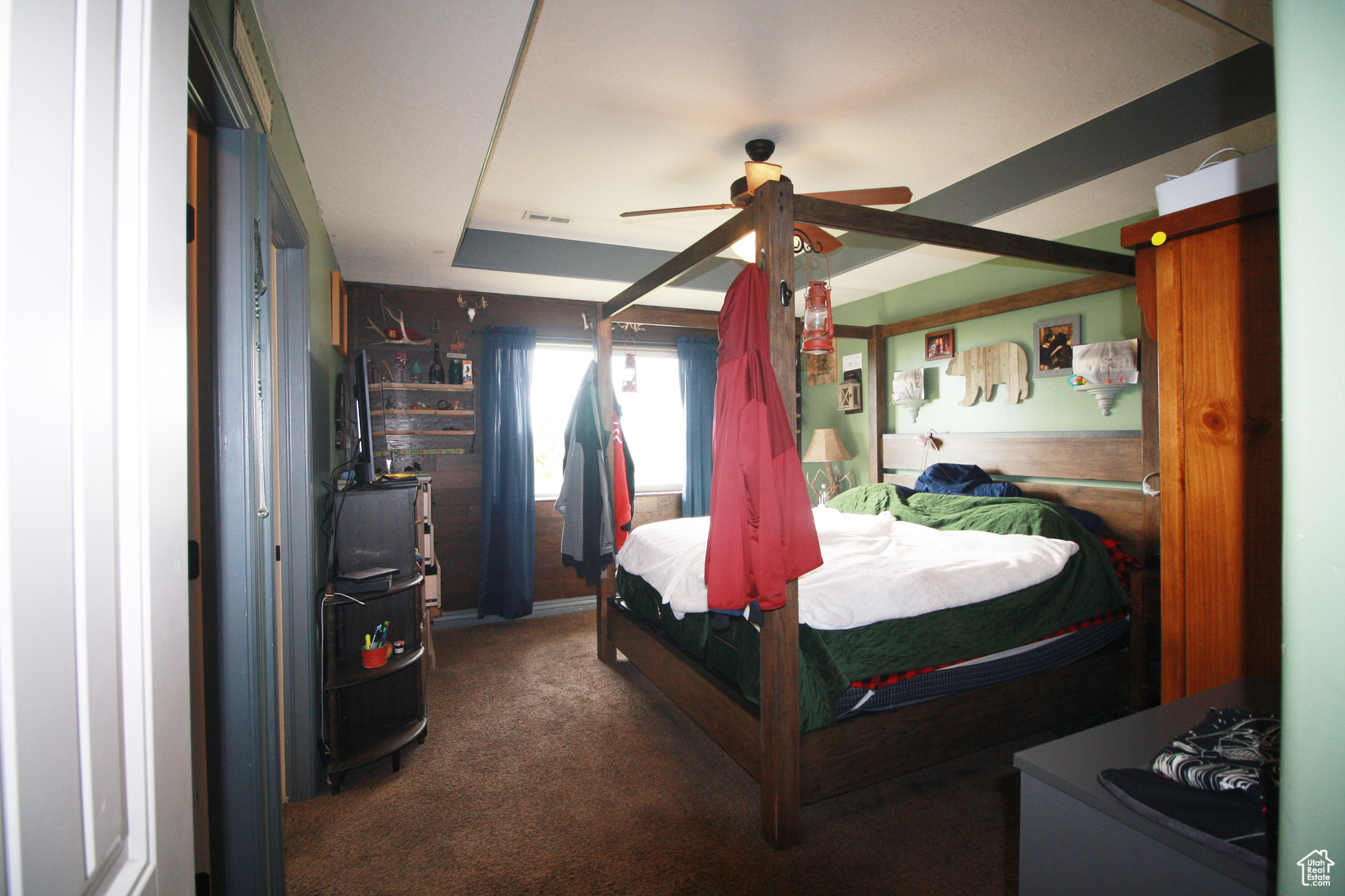 Carpeted Master Bedroom with ceiling fan