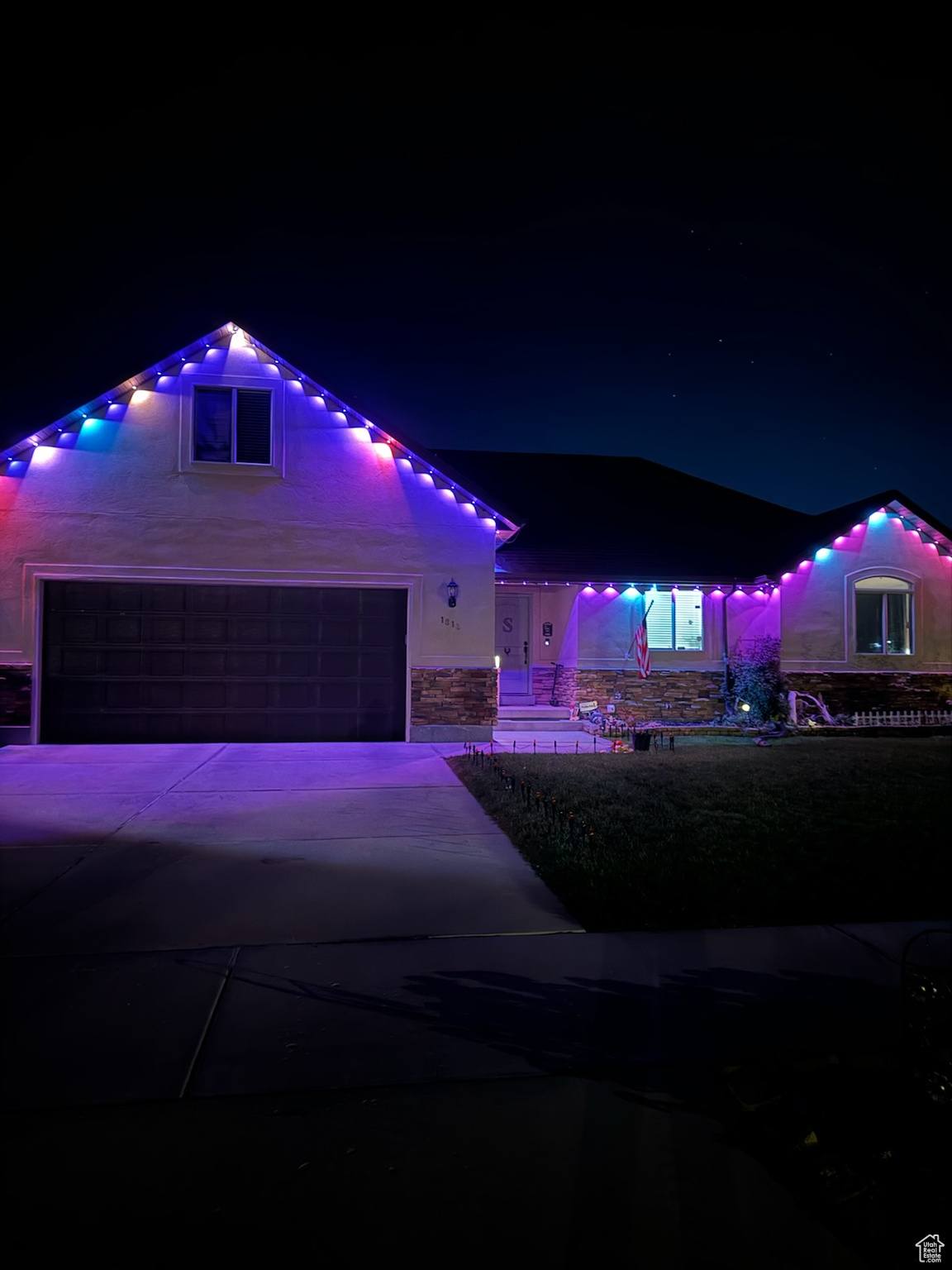 View of front of home featuring a garage