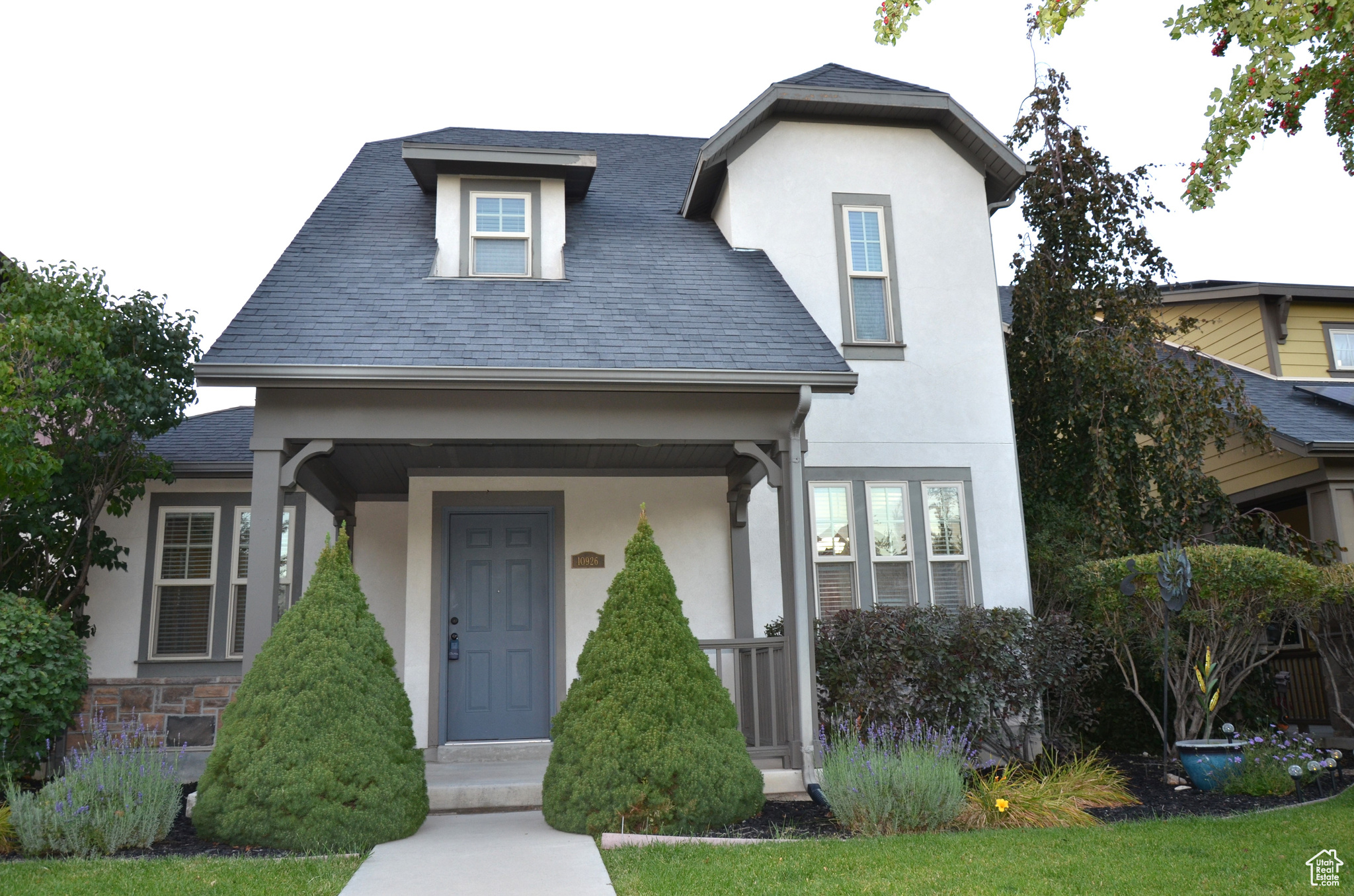 View of front of property featuring covered porch