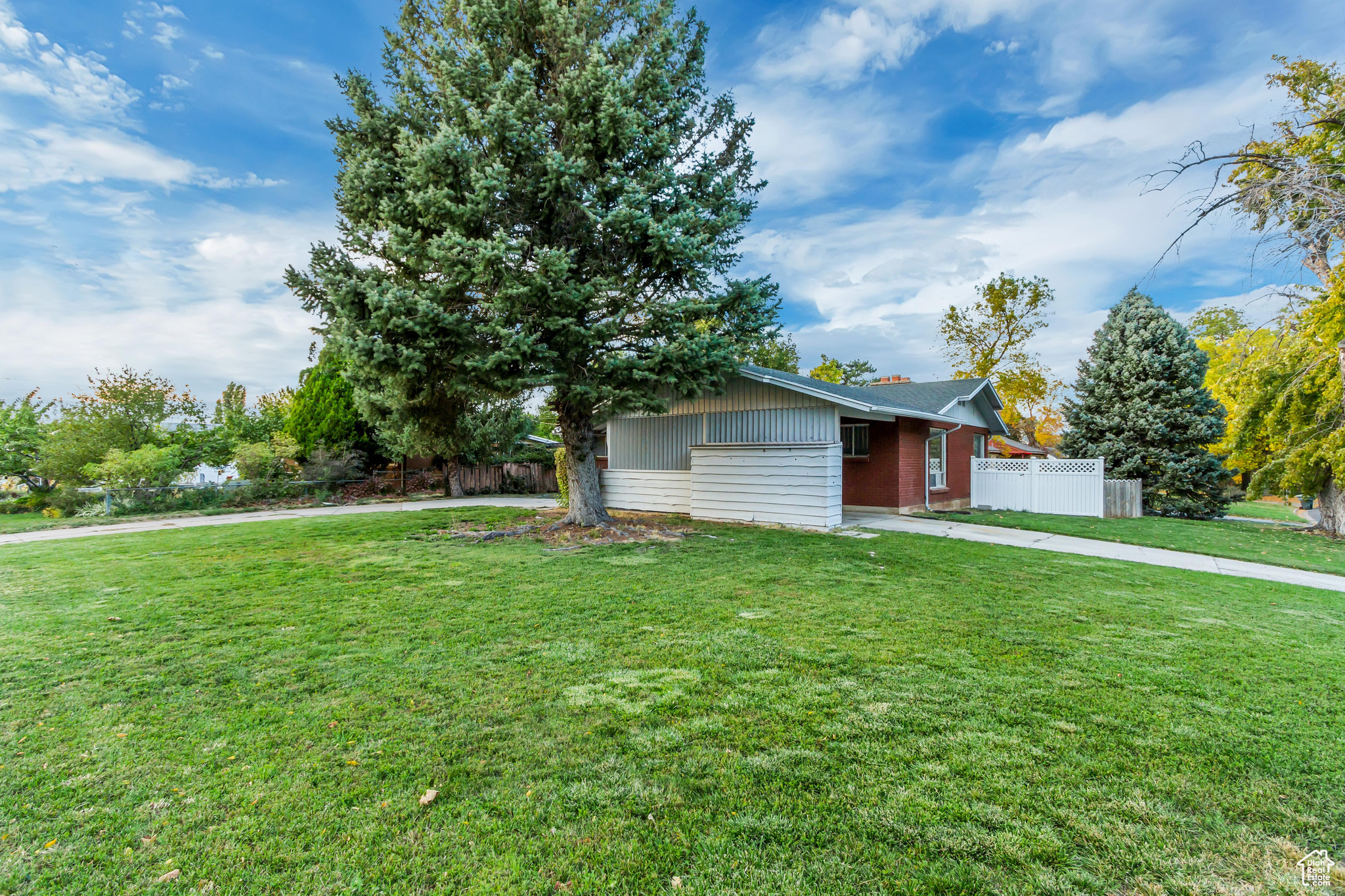 View of front of property with a front lawn