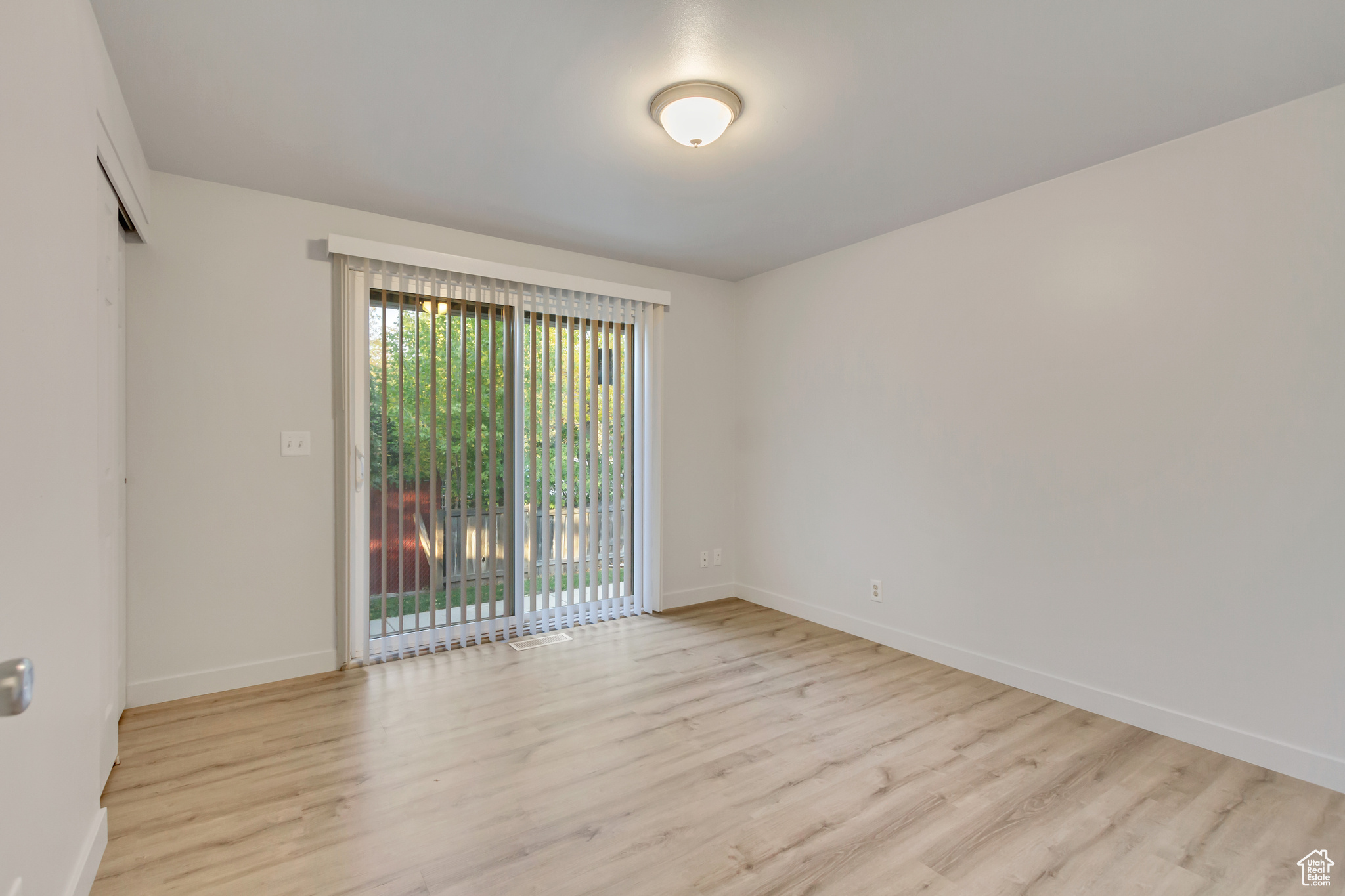 Empty room featuring light hardwood / wood-style floors