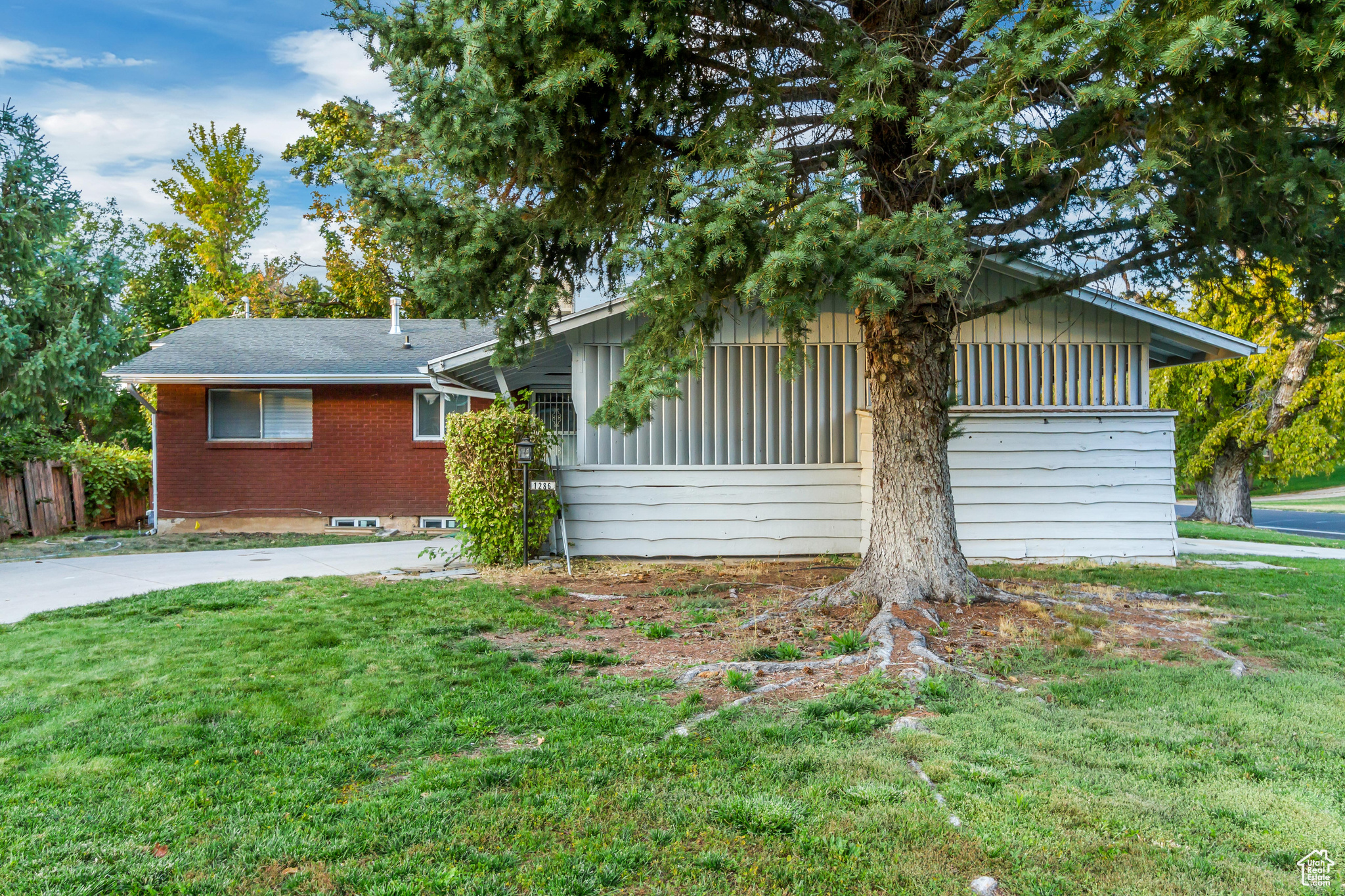 View of front of home featuring a front lawn