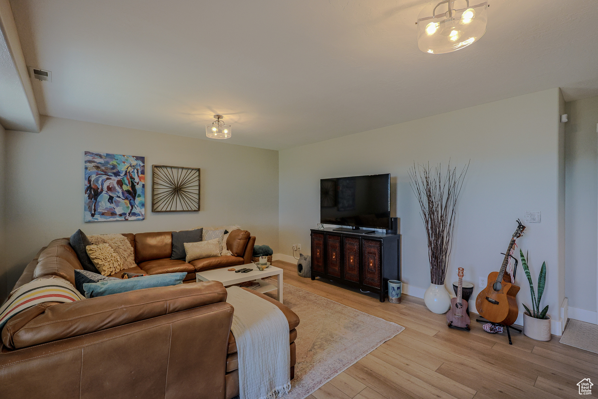 Living room featuring light hardwood / wood-style floors