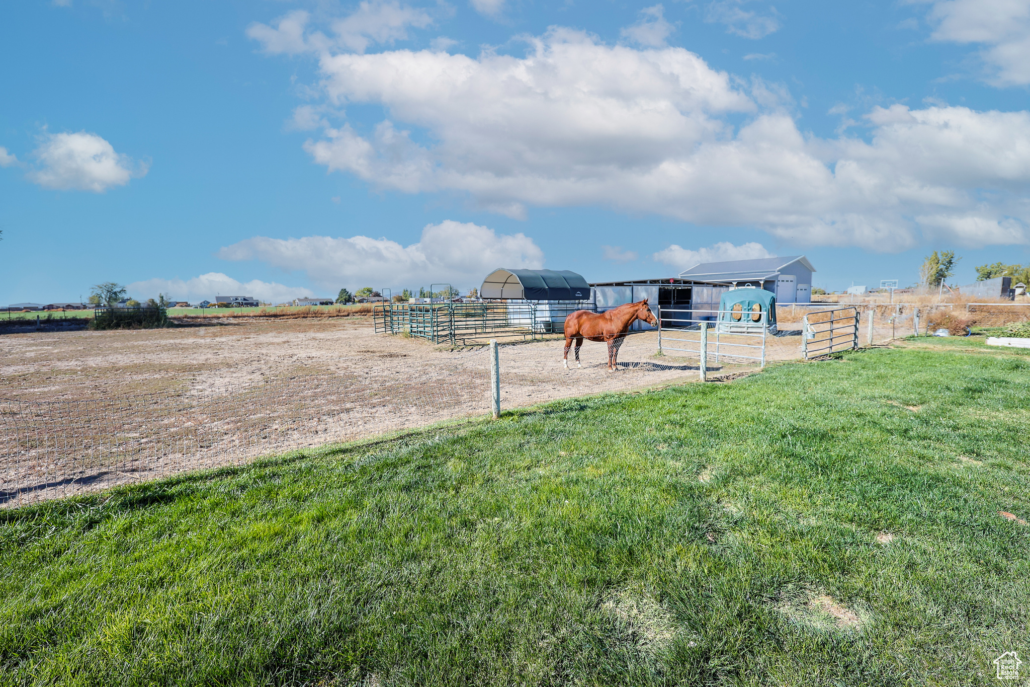 View of yard featuring a rural view and an outdoor structure